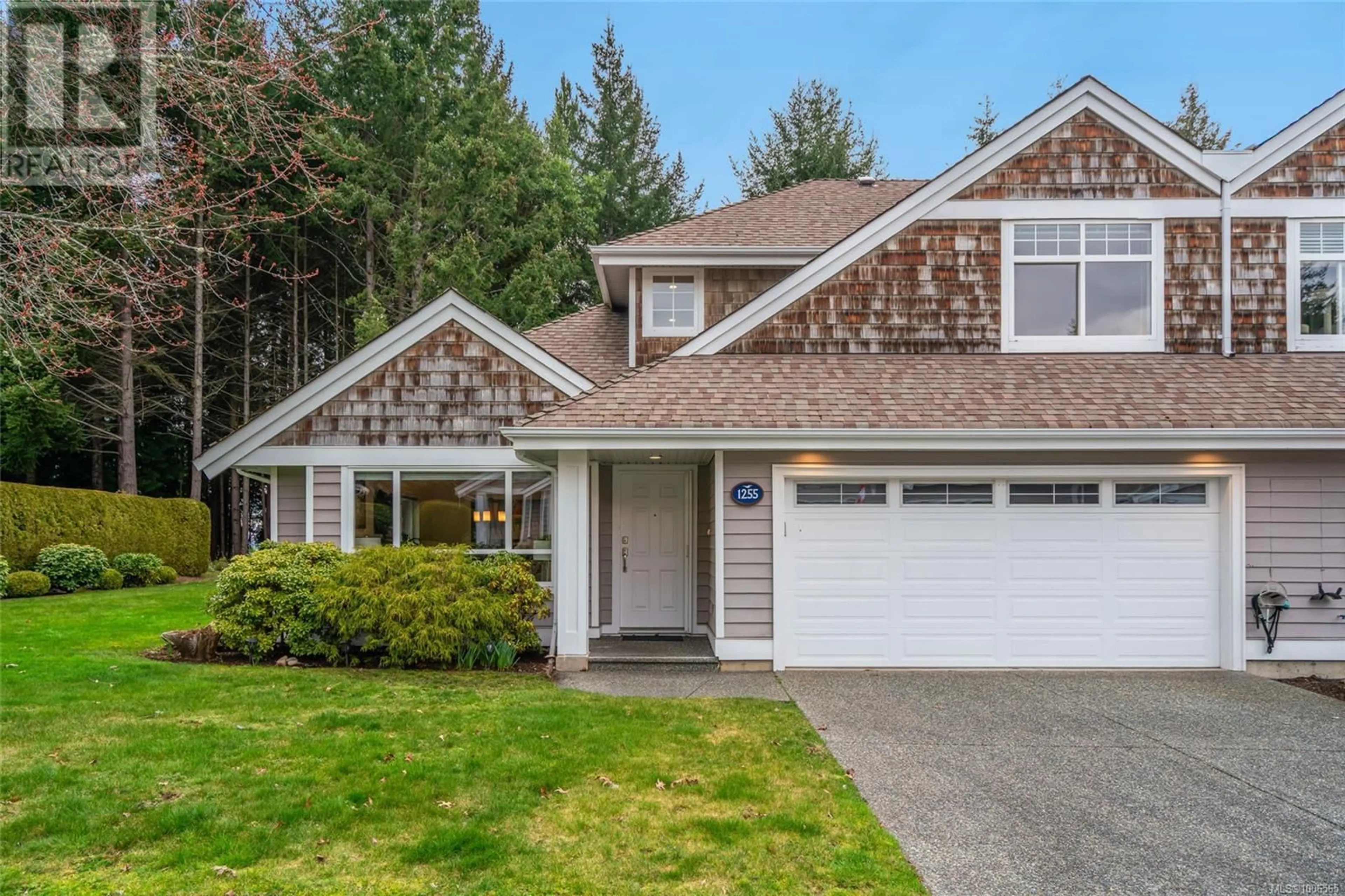 Home with vinyl exterior material, street for 1255 GABRIOLA DRIVE, Parksville British Columbia V9P2T5