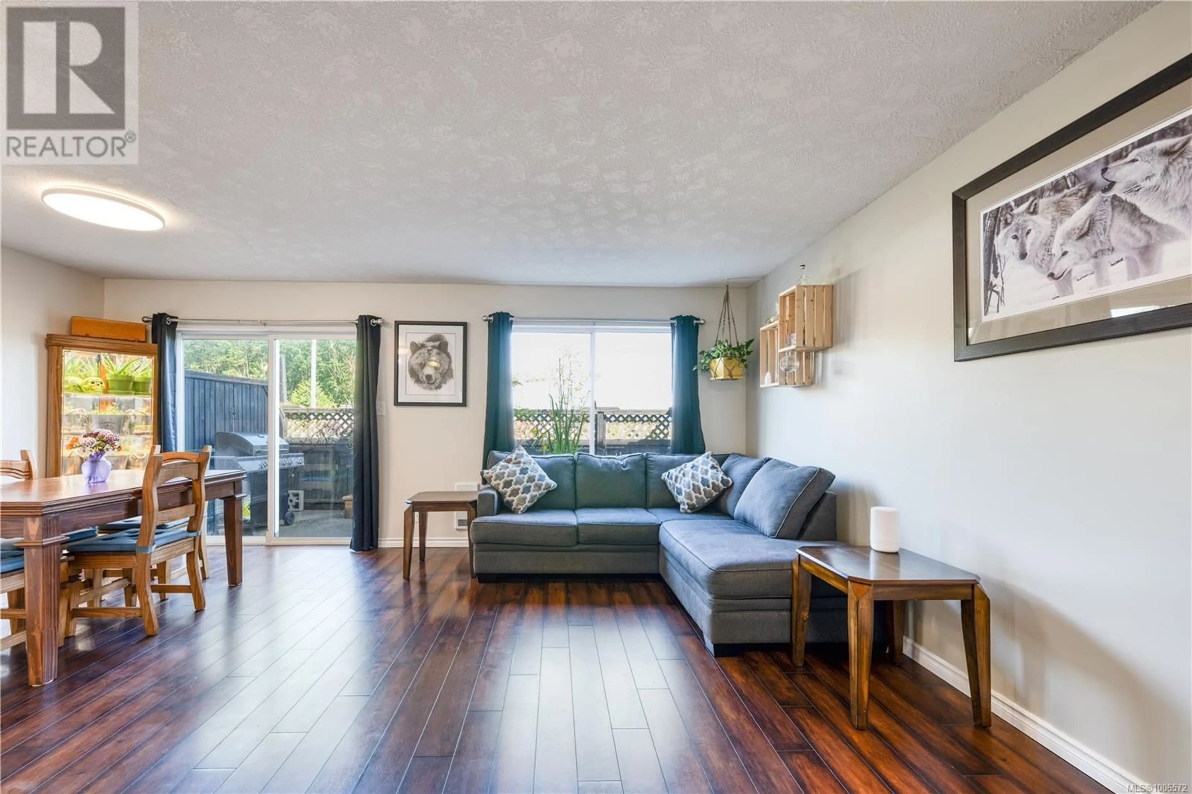 Living room with furniture, wood/laminate floor for 25 - 2697 MINE ROAD, Port McNeill British Columbia N0N2R0