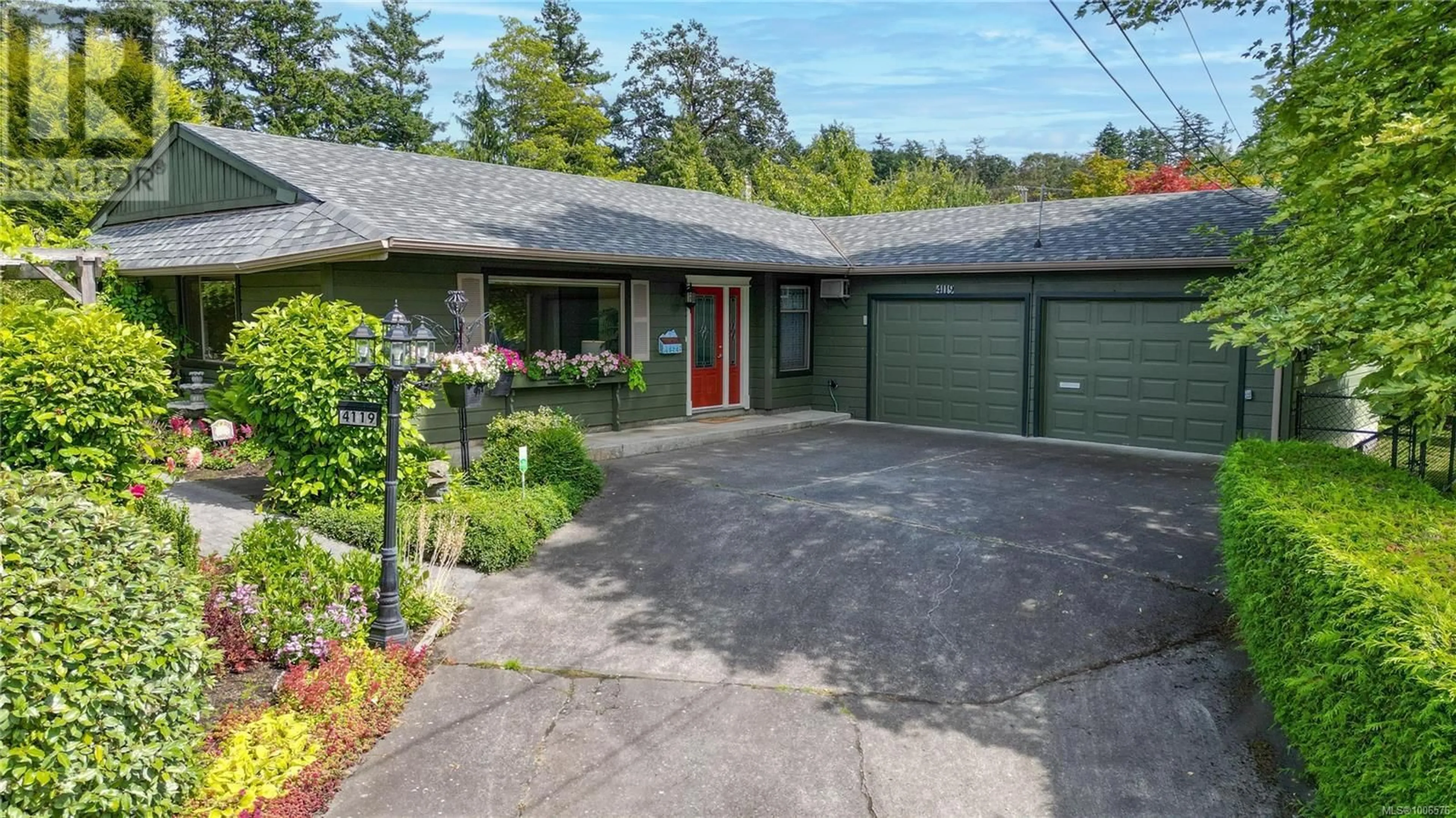 A pic from outside/outdoor area/front of a property/back of a property/a pic from drone, street for 4119 LARK ROAD, Saanich British Columbia V8X4G4