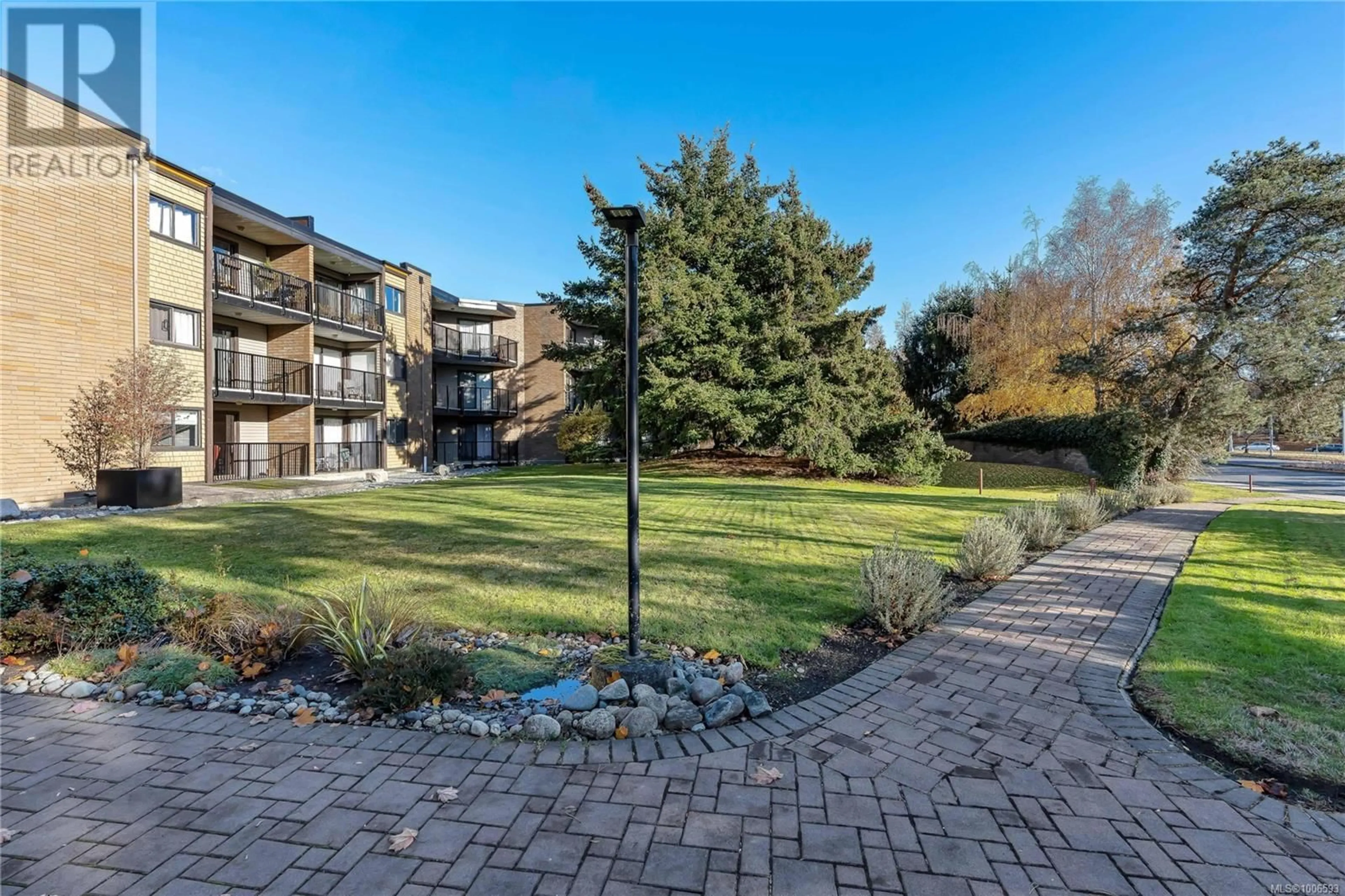 A pic from outside/outdoor area/front of a property/back of a property/a pic from drone, unknown for 205 - 1870 MCKENZIE AVENUE, Saanich British Columbia V8N4X3