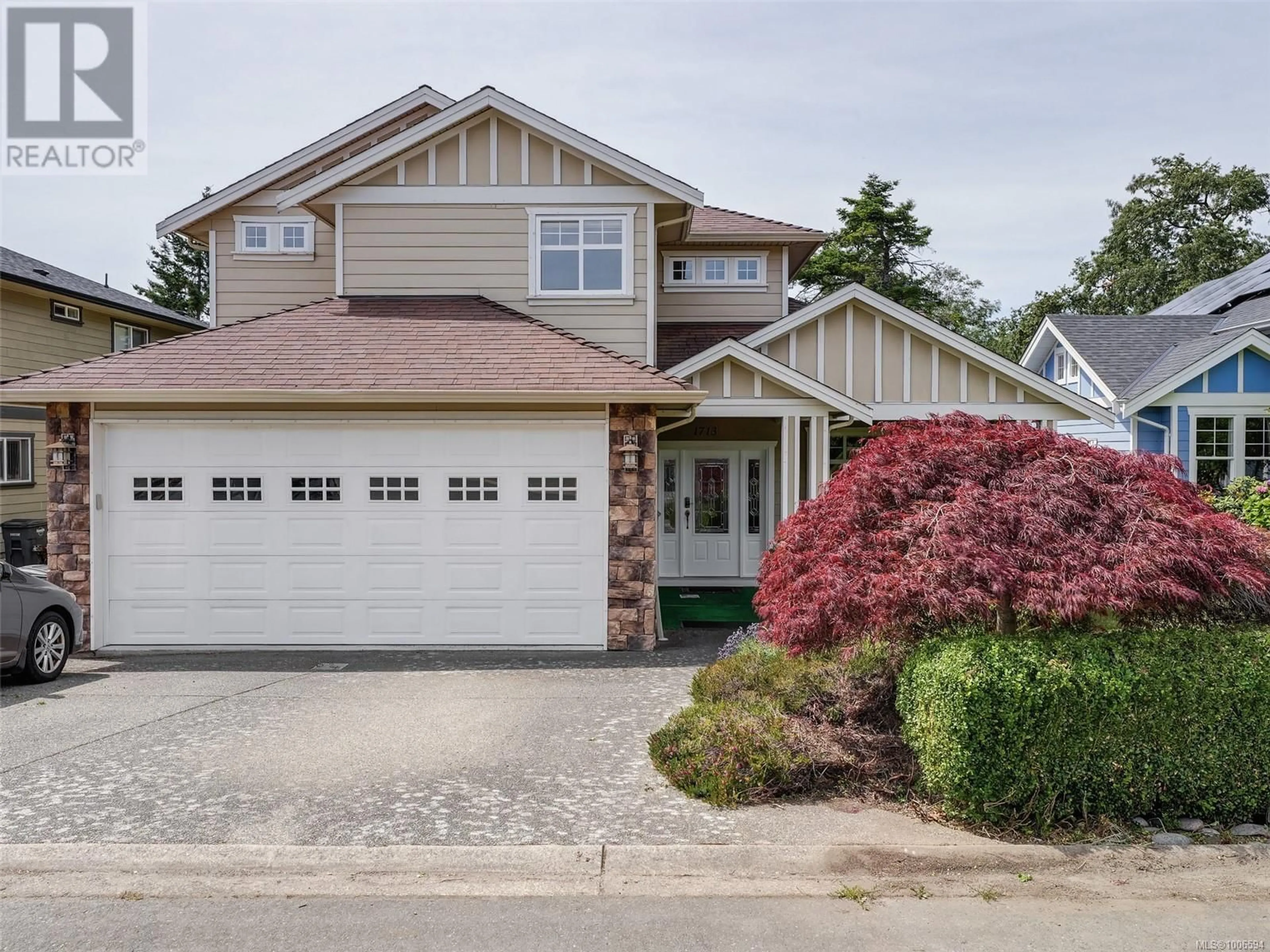 Home with vinyl exterior material, street for 1713 MAMICH CIRCLE, Saanich British Columbia V8N3S3