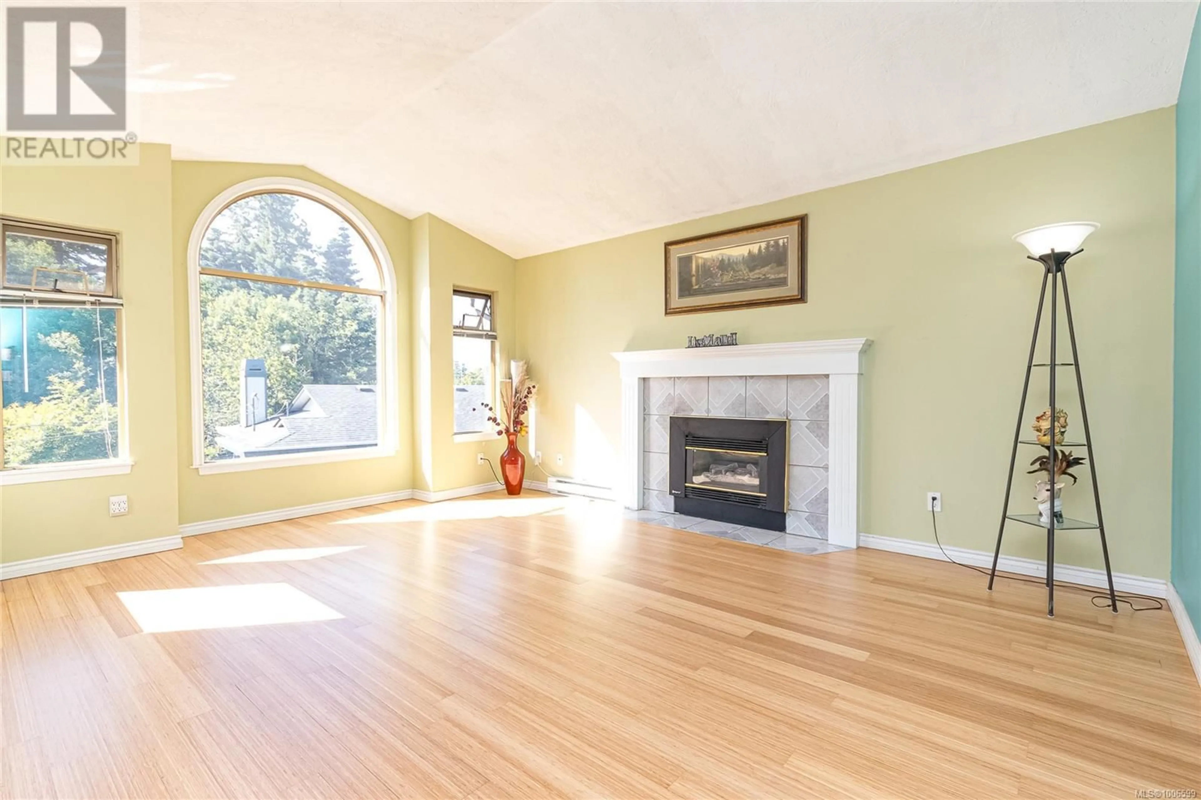 Living room with furniture, wood/laminate floor for 6756 HORNE ROAD, Sooke British Columbia V9Z0A2