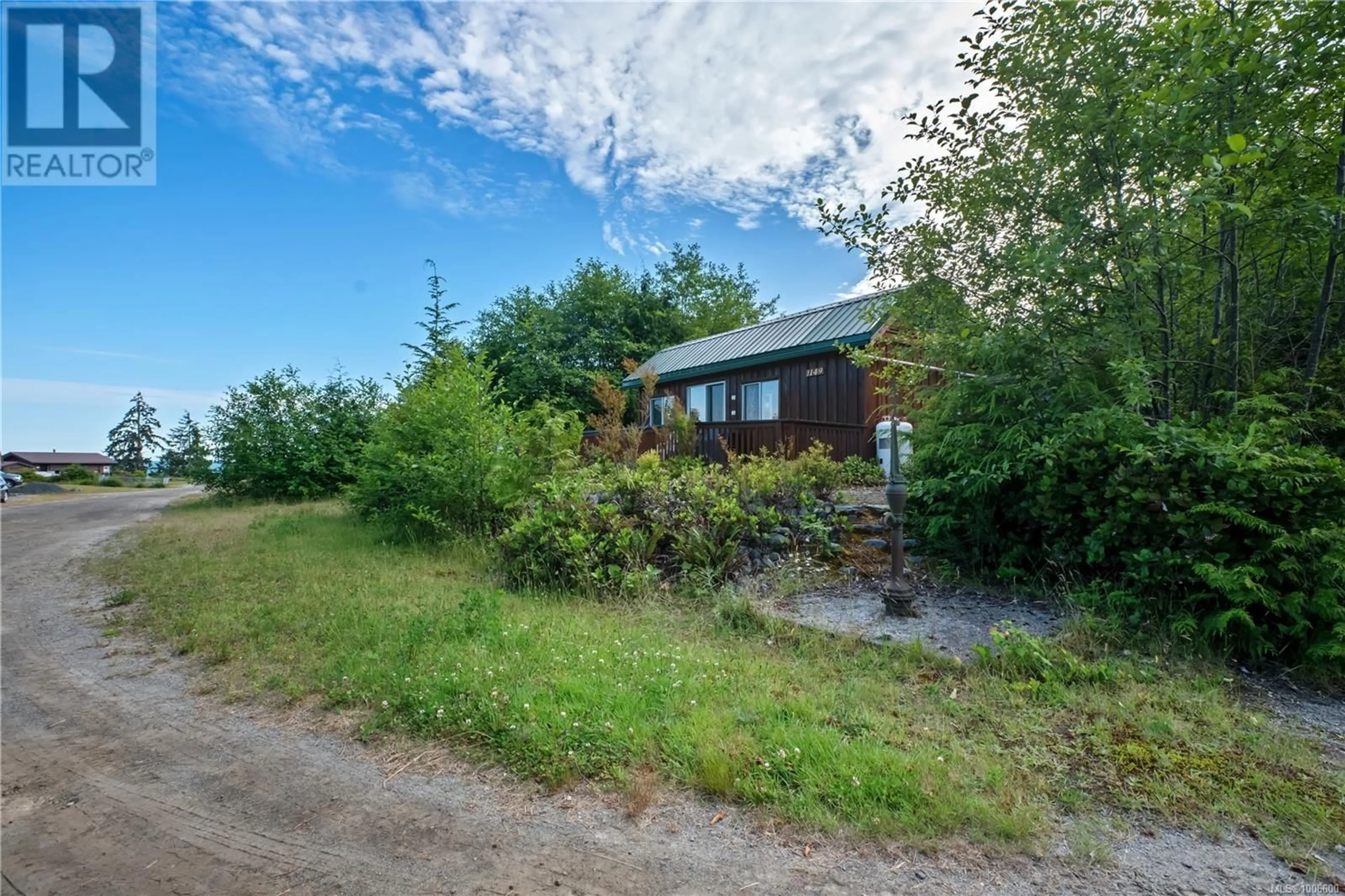 A pic from outside/outdoor area/front of a property/back of a property/a pic from drone, street for 1149 THIRD AVENUE, Ucluelet British Columbia V0R3A0