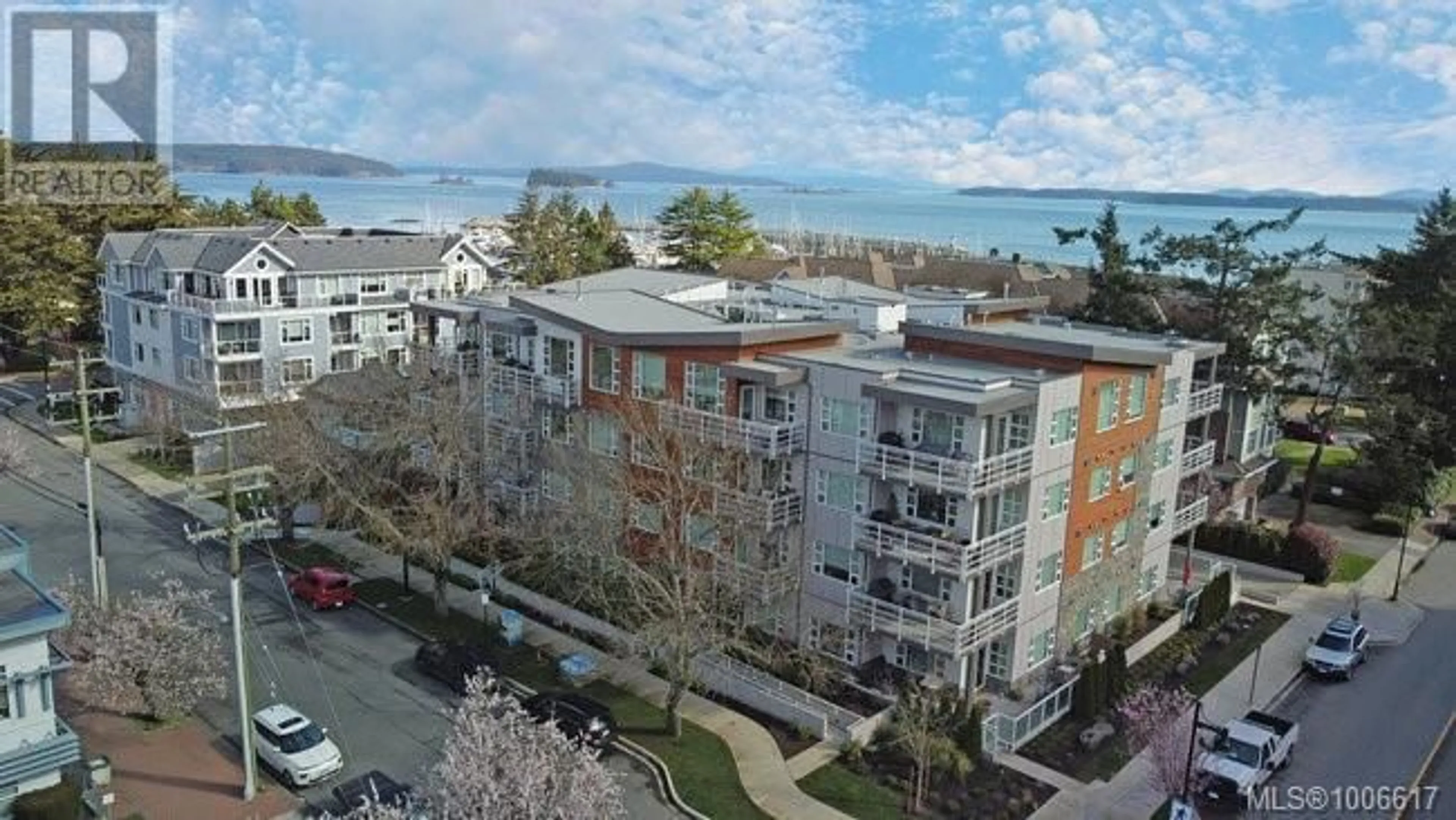 A pic from outside/outdoor area/front of a property/back of a property/a pic from drone, water/lake/river/ocean view for 207 - 9861 THIRD STREET, Sidney British Columbia V8L3A8
