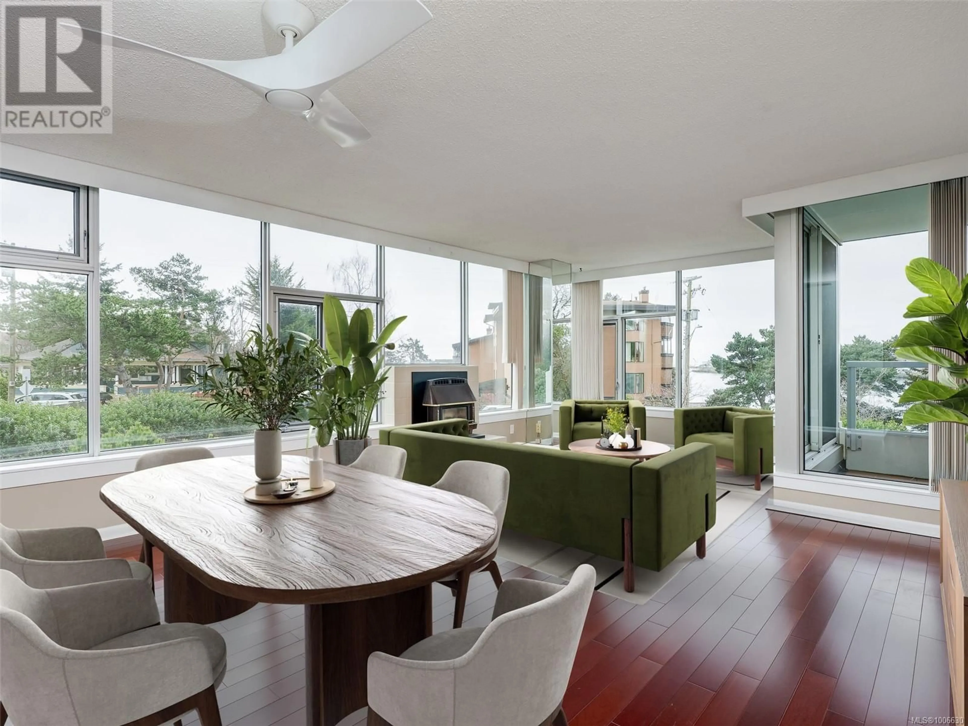 Living room with furniture, wood/laminate floor for 202 - 325 MAITLAND STREET, Victoria British Columbia V9A7E9