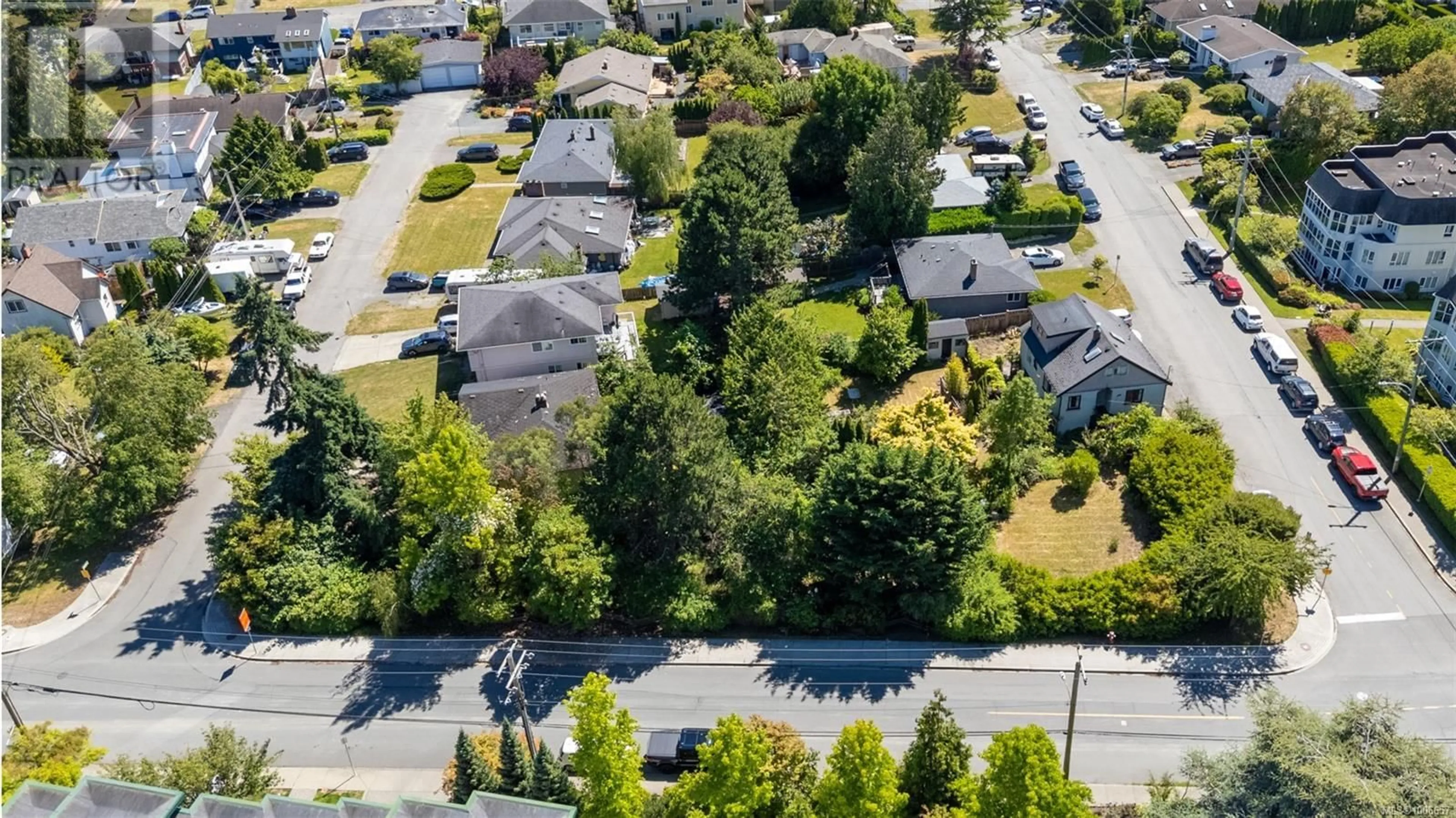 A pic from outside/outdoor area/front of a property/back of a property/a pic from drone, street for 1539 CHURCH AVENUE, Saanich British Columbia V8P2G9
