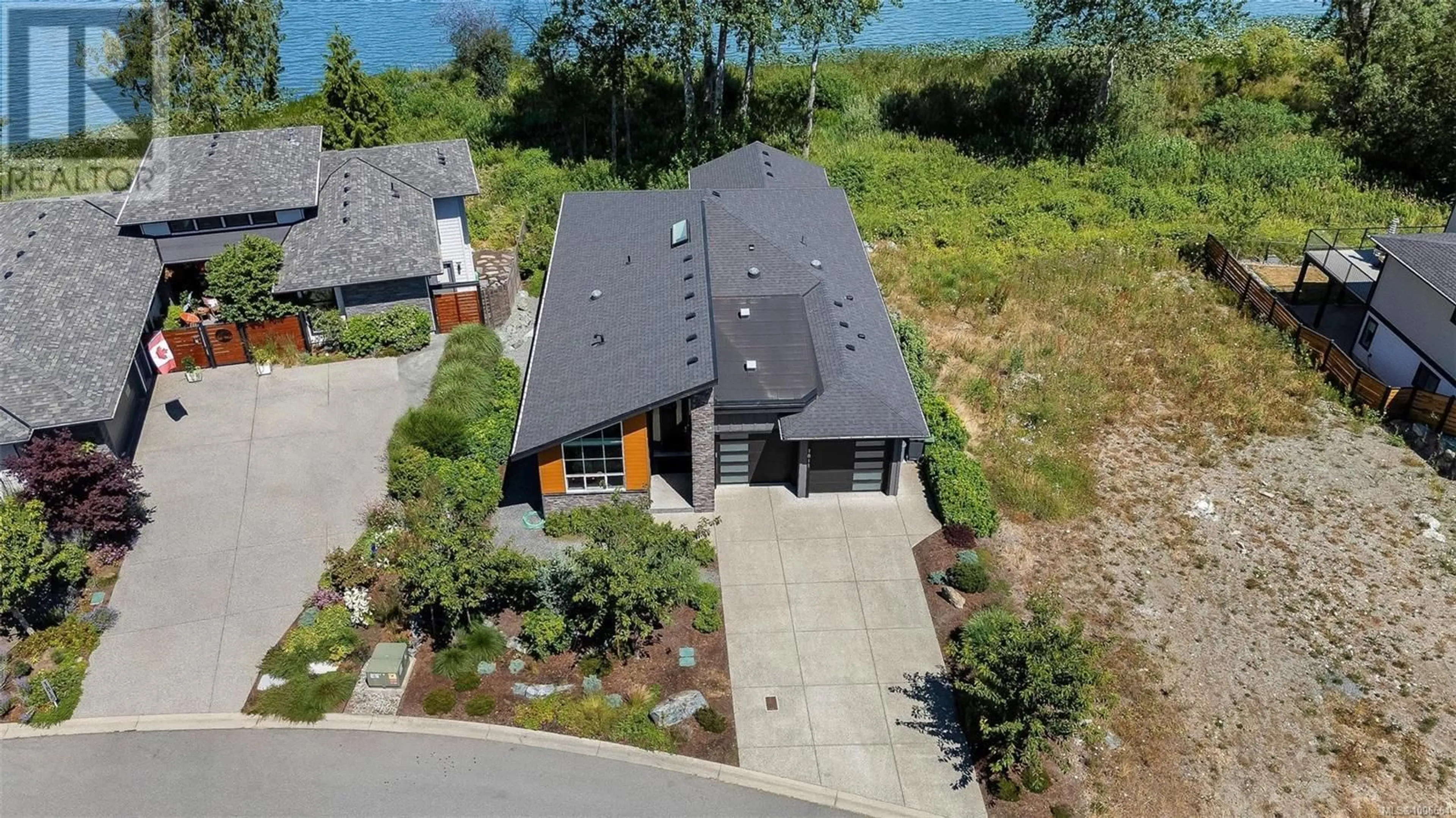 A pic from outside/outdoor area/front of a property/back of a property/a pic from drone, street for 1811 WESTLOCK ROAD, Duncan British Columbia V9L5N7