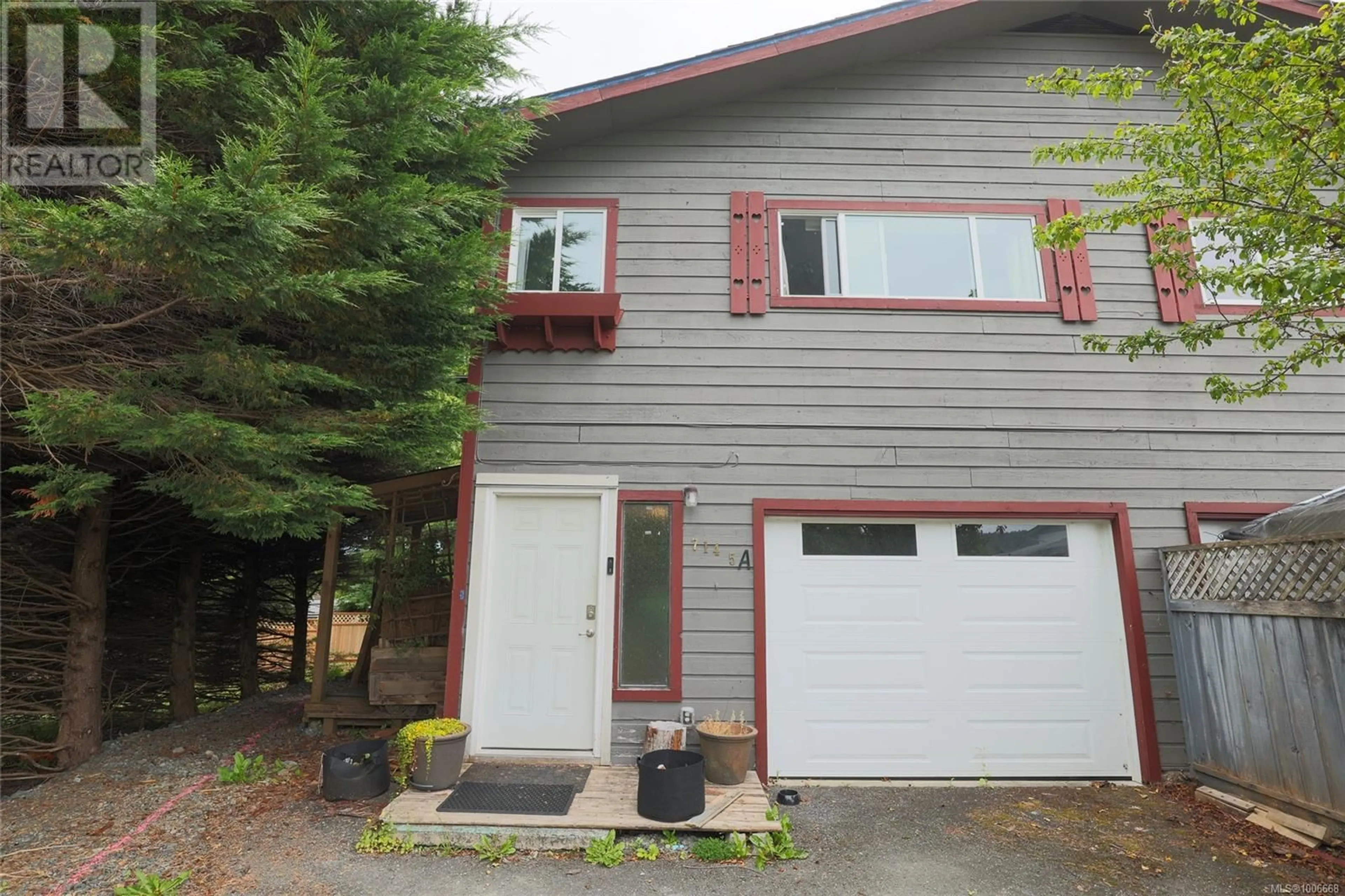 Home with vinyl exterior material, street for 7145A HIGHLAND DRIVE, Port Hardy British Columbia V0N2P0