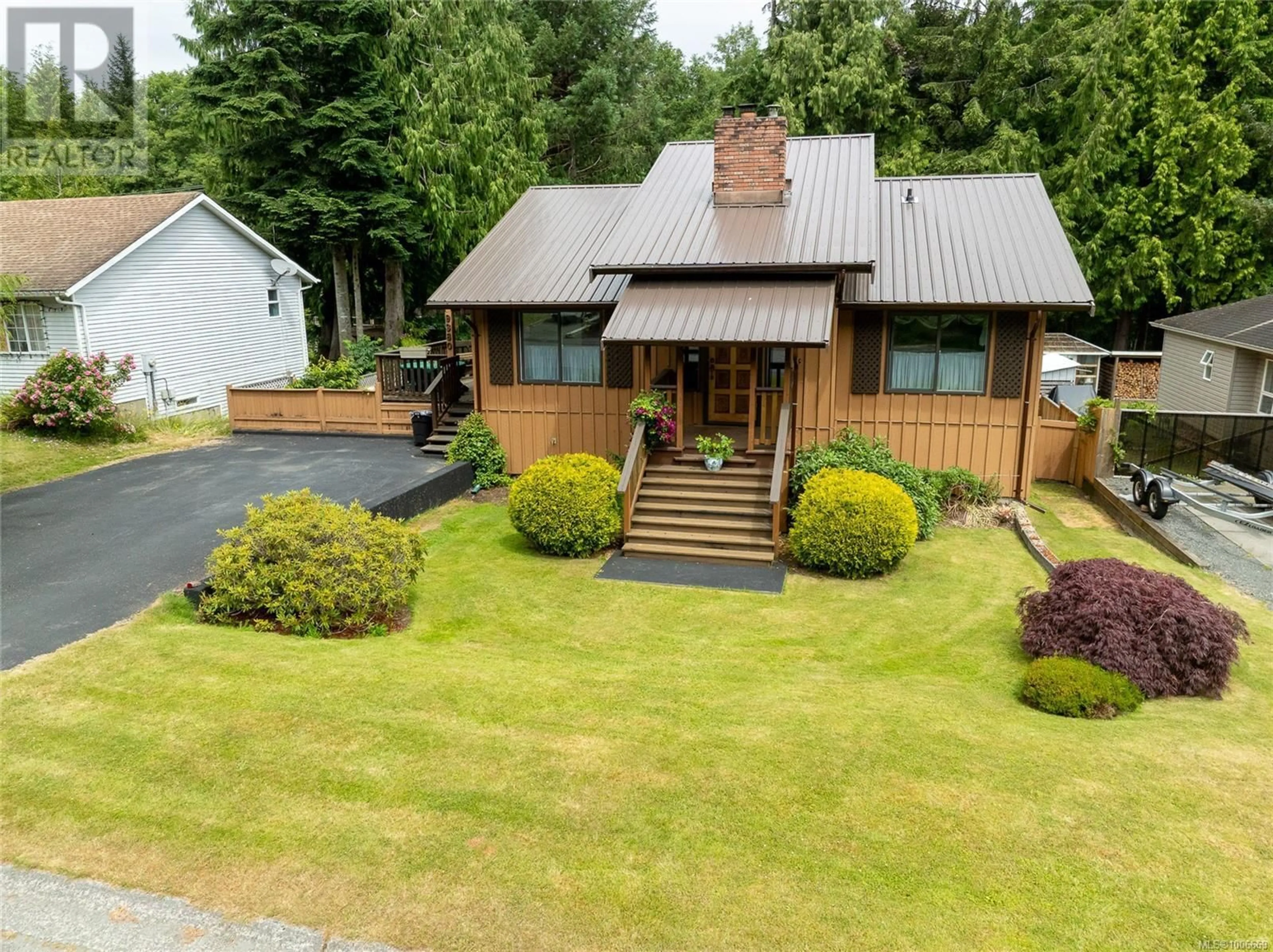 A pic from outside/outdoor area/front of a property/back of a property/a pic from drone, street for 9380 ELK DRIVE, Port Hardy British Columbia V0N2P0