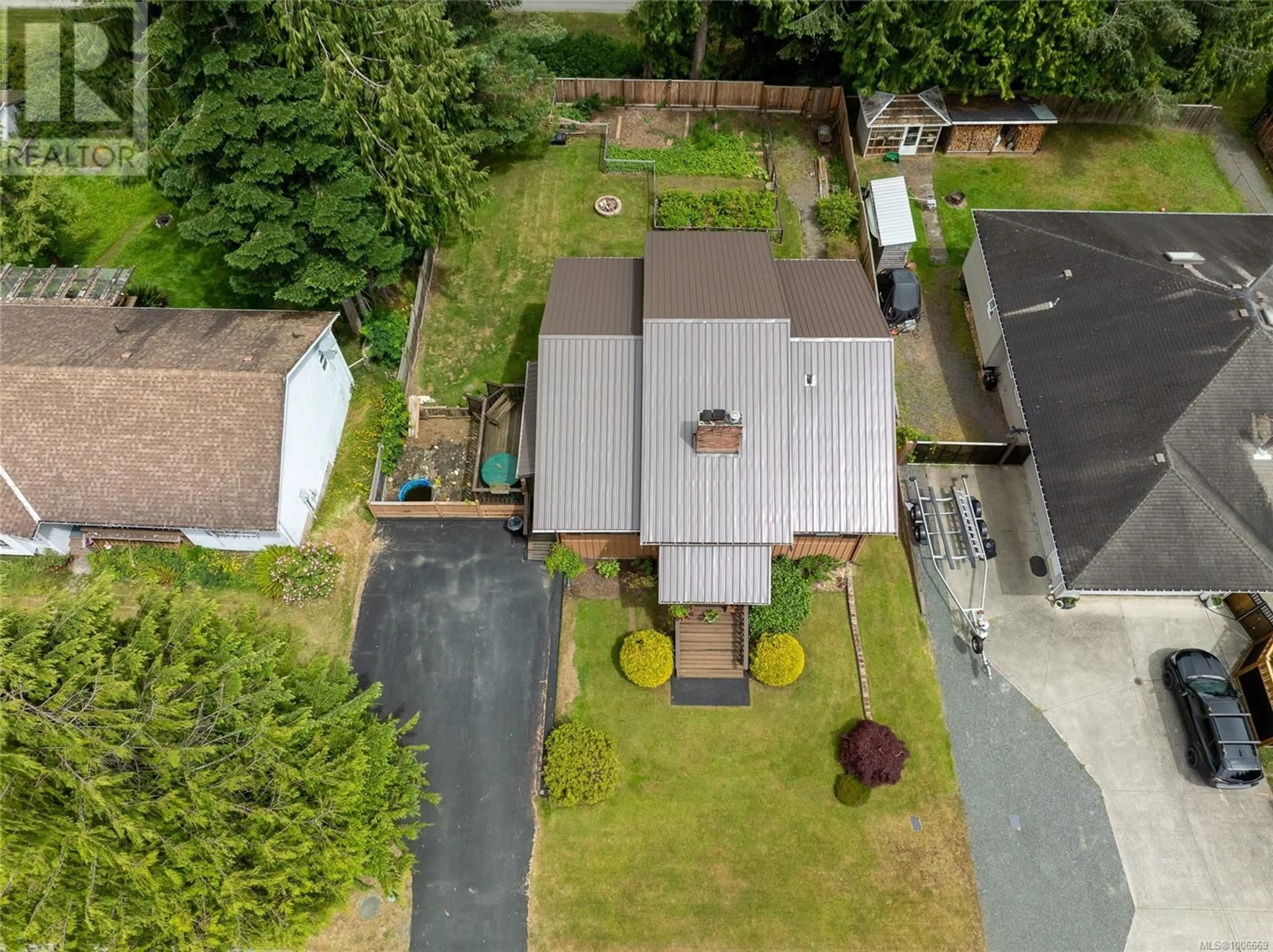 A pic from outside/outdoor area/front of a property/back of a property/a pic from drone, street for 9380 ELK DRIVE, Port Hardy British Columbia V0N2P0
