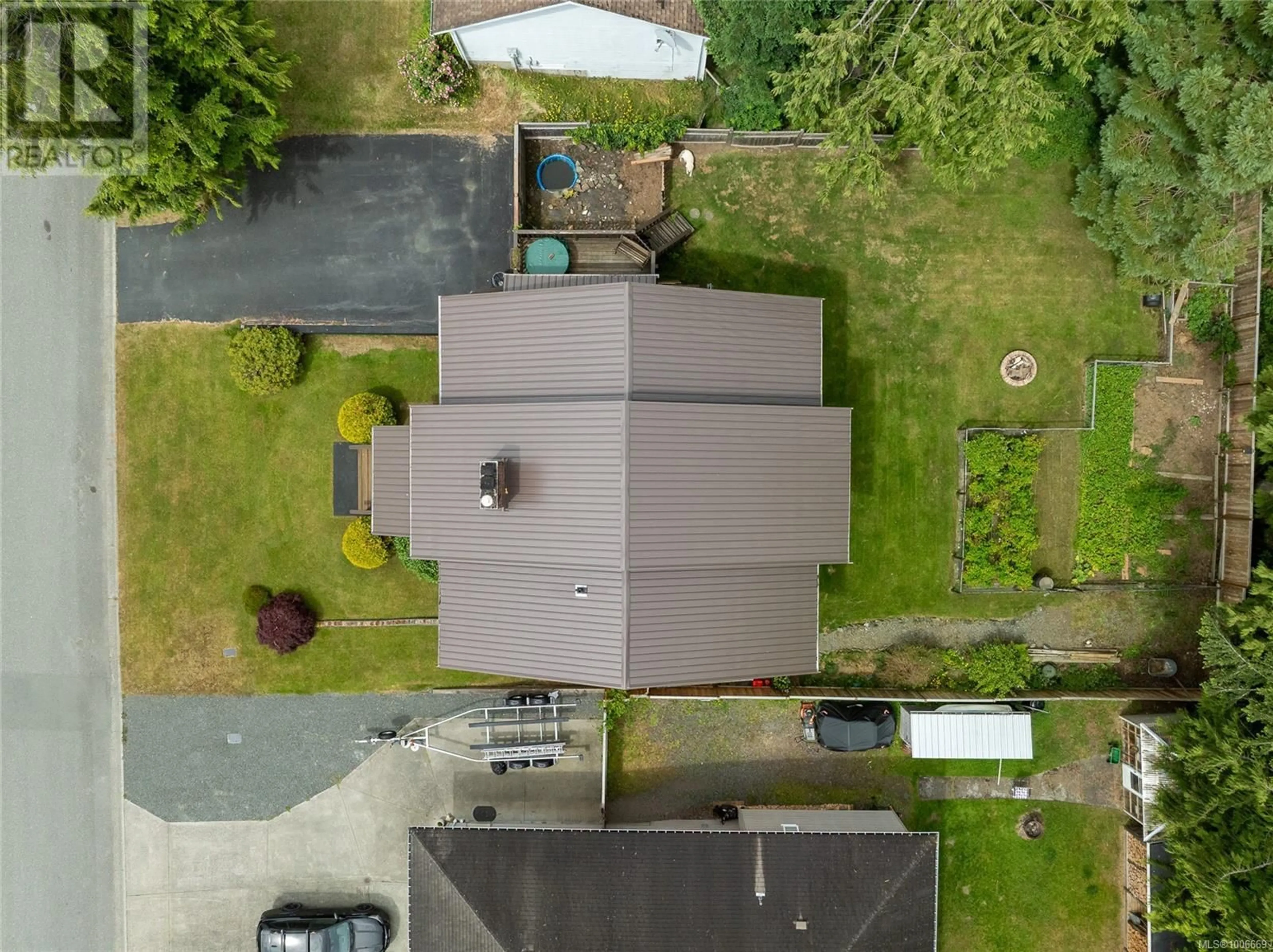 A pic from outside/outdoor area/front of a property/back of a property/a pic from drone, unknown for 9380 ELK DRIVE, Port Hardy British Columbia V0N2P0