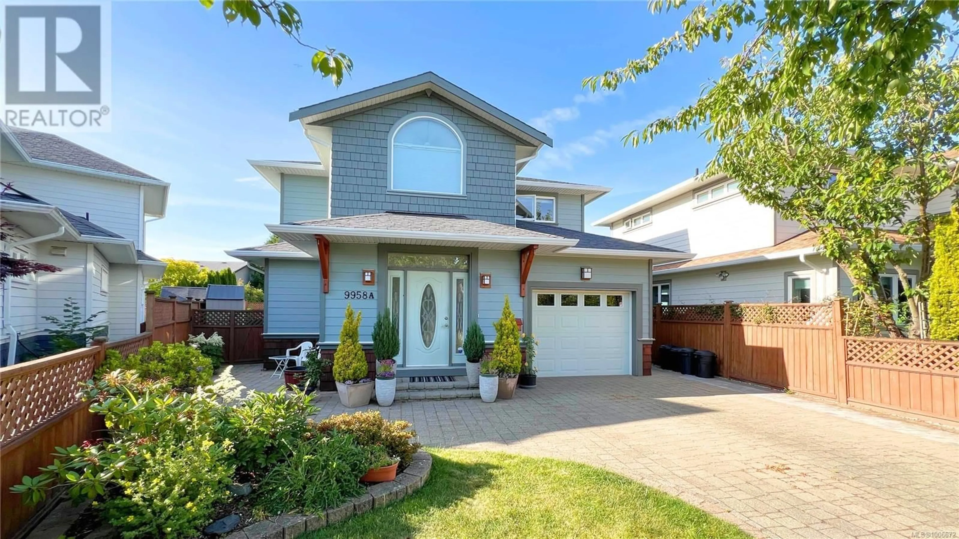 Home with vinyl exterior material, street for 9958A SWIFTSURE PLACE, Sidney British Columbia V8L4E4