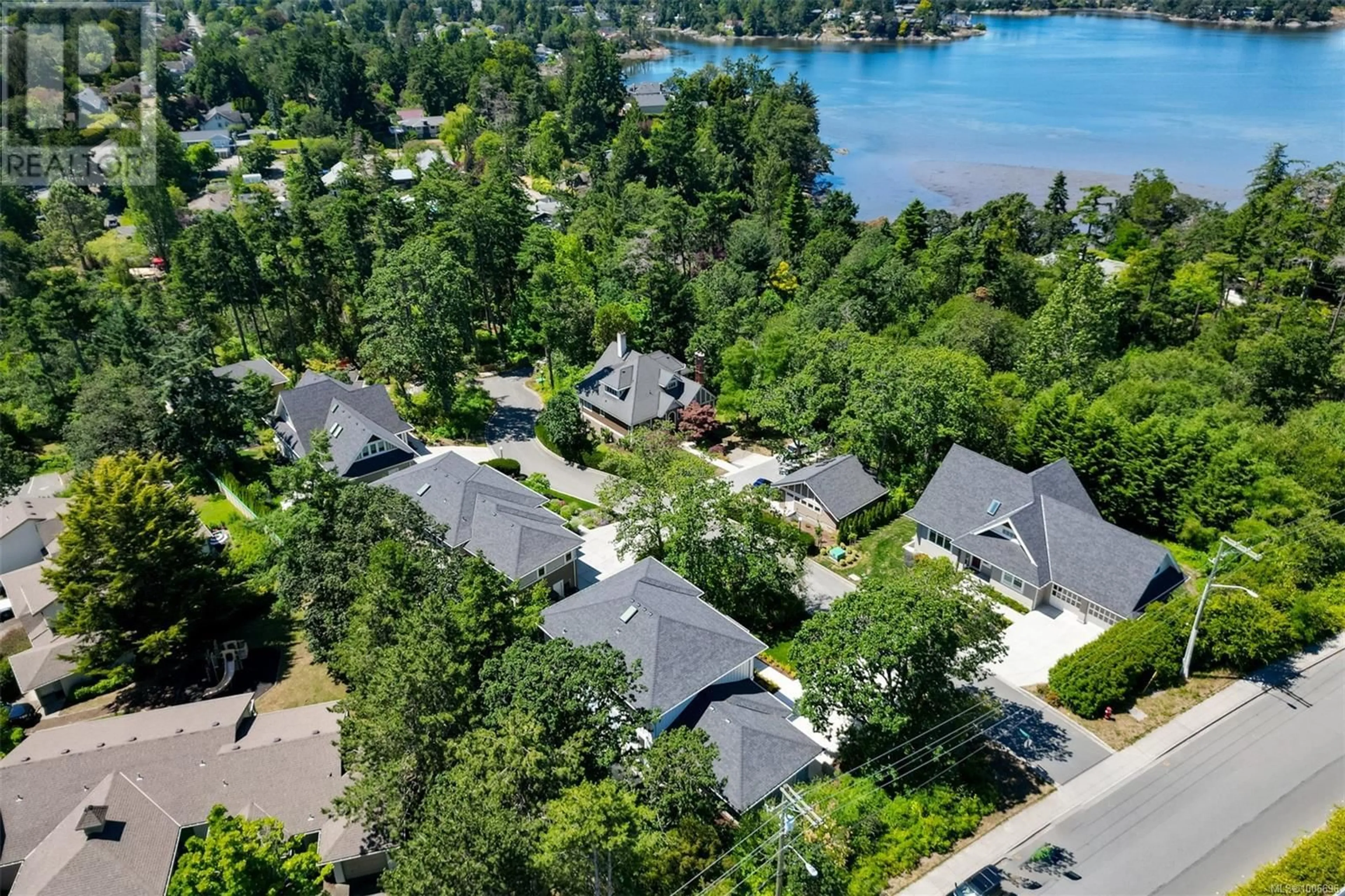 A pic from outside/outdoor area/front of a property/back of a property/a pic from drone, water/lake/river/ocean view for 3147 BOWKETT PLACE, Saanich British Columbia V8Z1K9