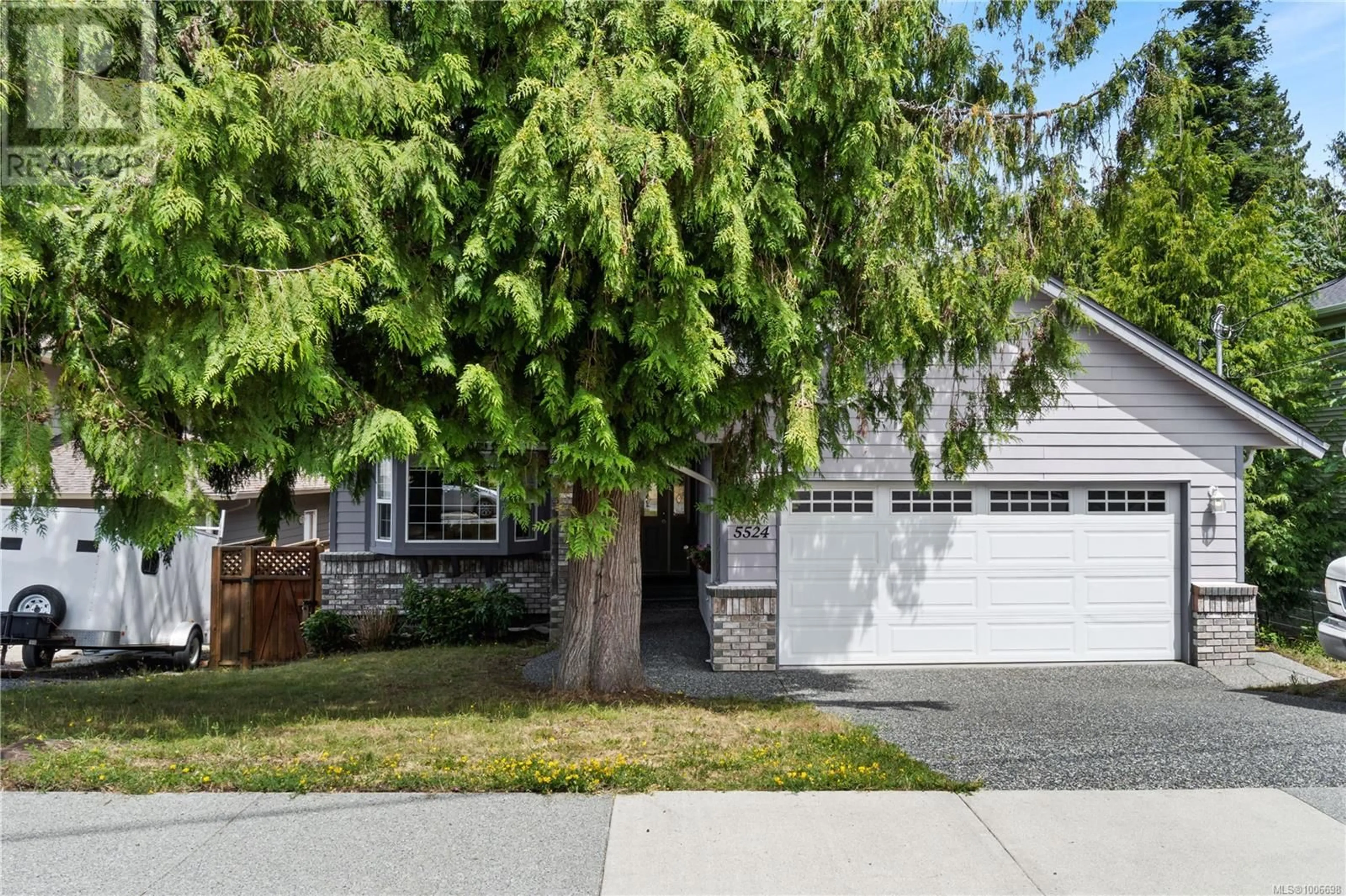 Home with vinyl exterior material, street for 5524 AVRO WAY, Nanaimo British Columbia V9T4Z3