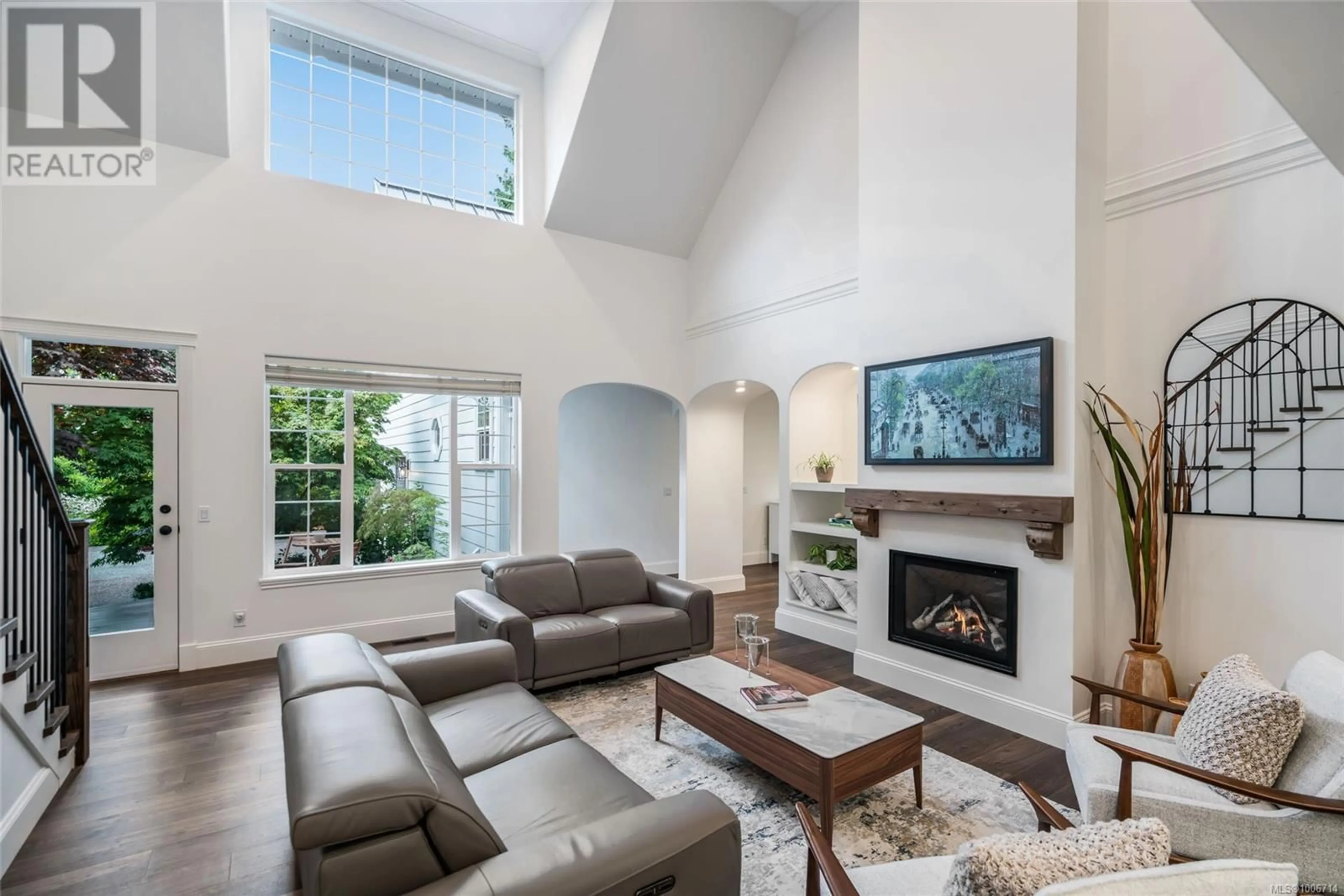 Living room with furniture, ceramic/tile floor for 155 HOYLAKE ROAD EAST, Qualicum Beach British Columbia V9K1L7