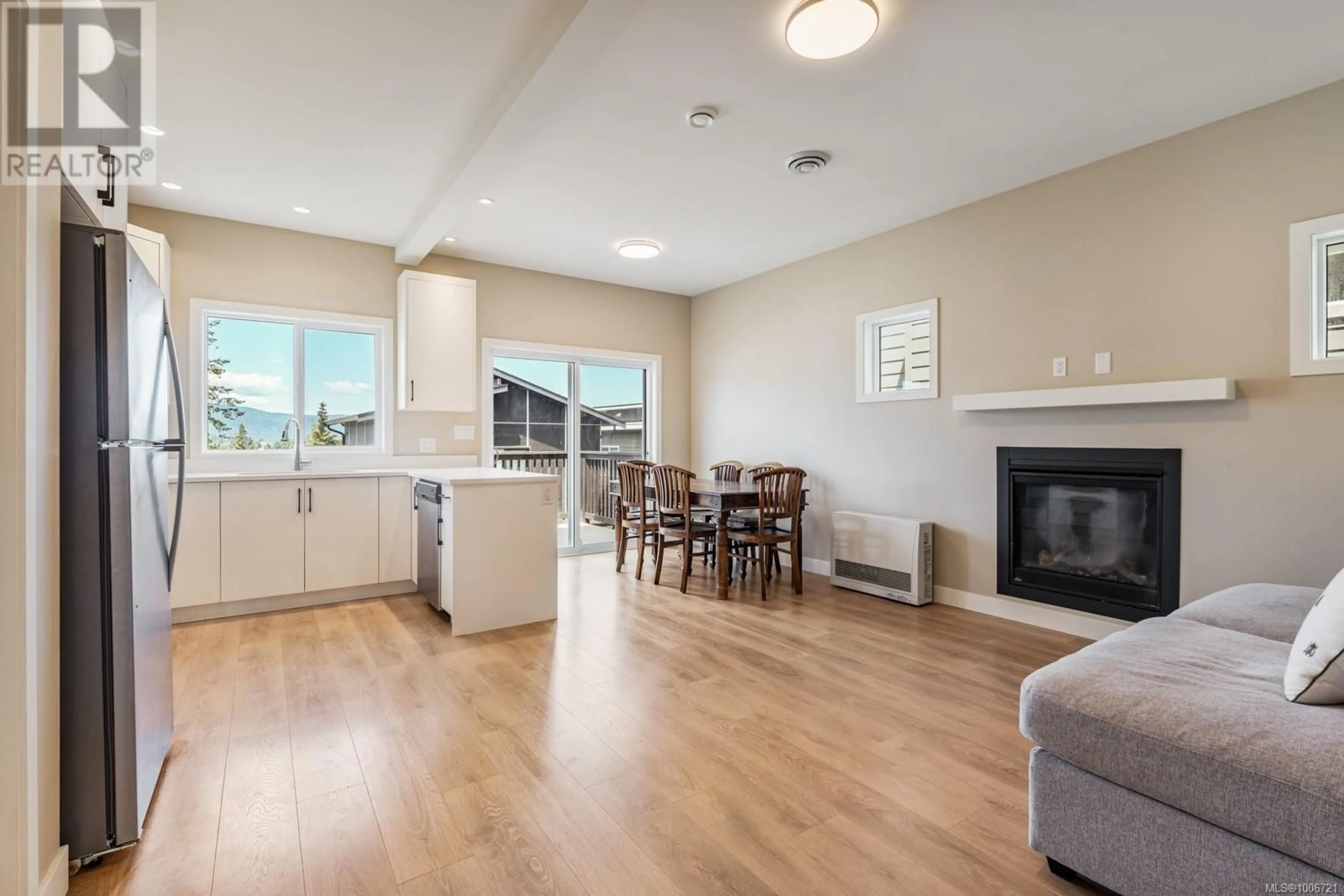 Open concept kitchen, wood/laminate floor for 3469 MYLES MANSELL ROAD, Langford British Columbia V9C0N6