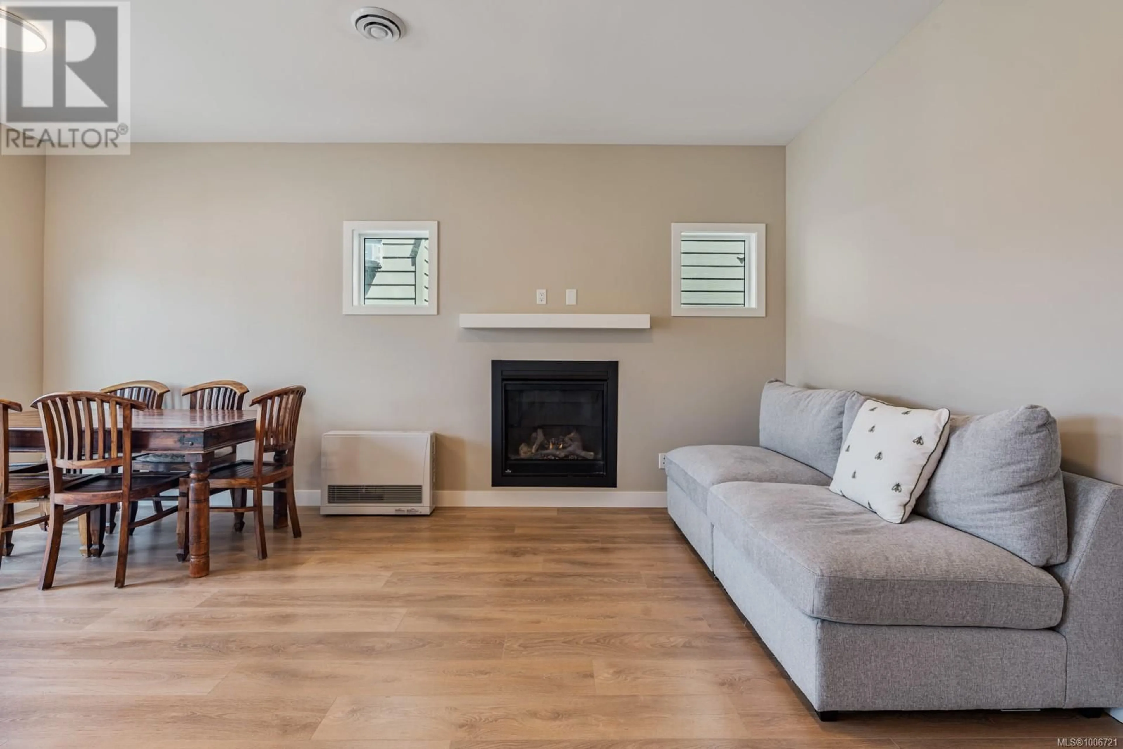 Living room with furniture, wood/laminate floor for 3469 MYLES MANSELL ROAD, Langford British Columbia V9C0N6
