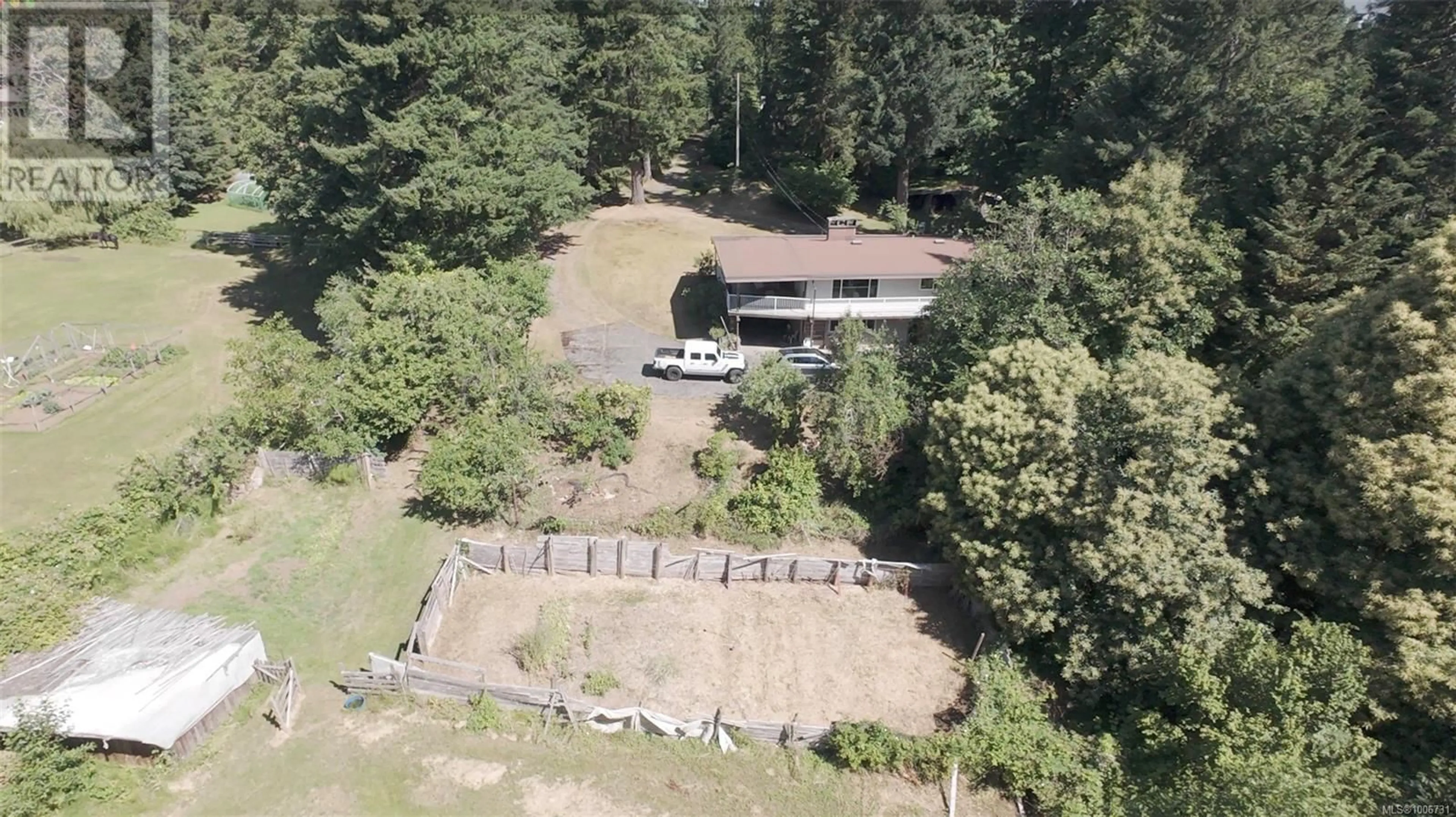A pic from outside/outdoor area/front of a property/back of a property/a pic from drone, forest/trees view for 1581 CROATION ROAD, Campbell River British Columbia V9W3T4