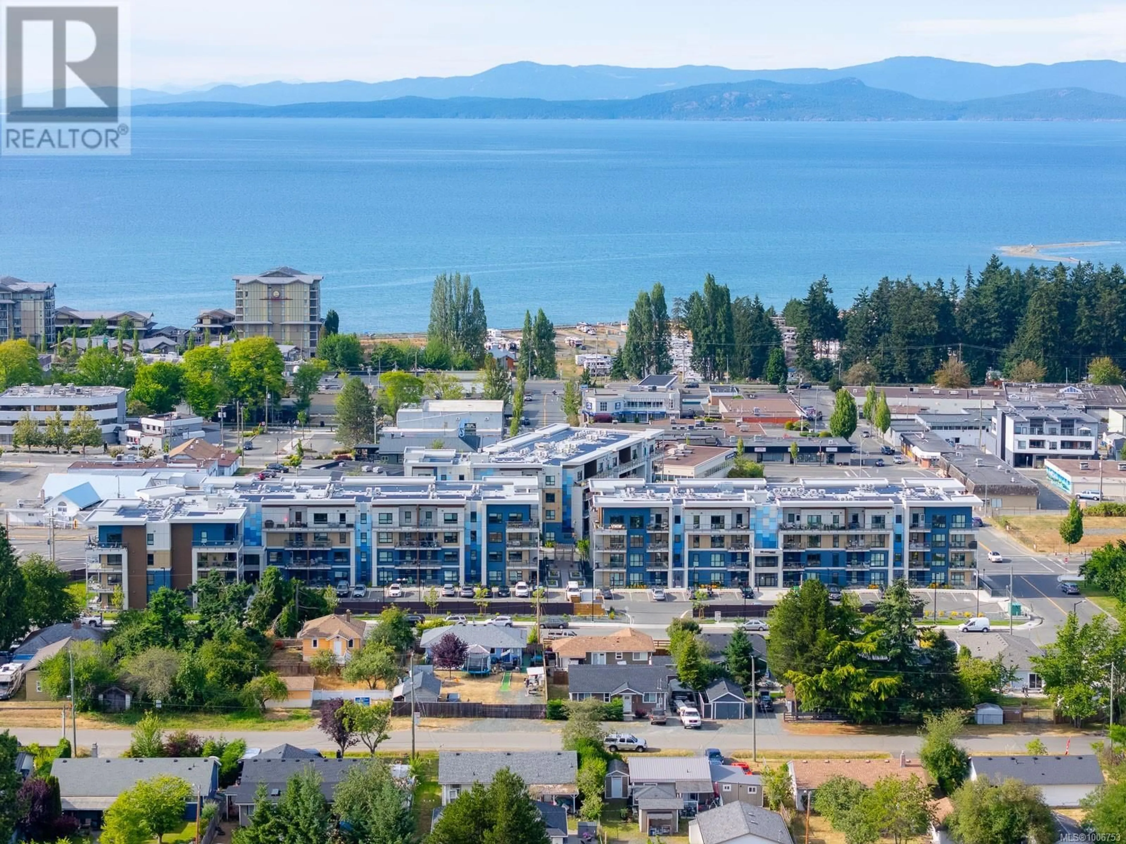 A pic from outside/outdoor area/front of a property/back of a property/a pic from drone, water/lake/river/ocean view for 406 - 140 JENSEN AVENUE WEST, Parksville British Columbia V9P0H7
