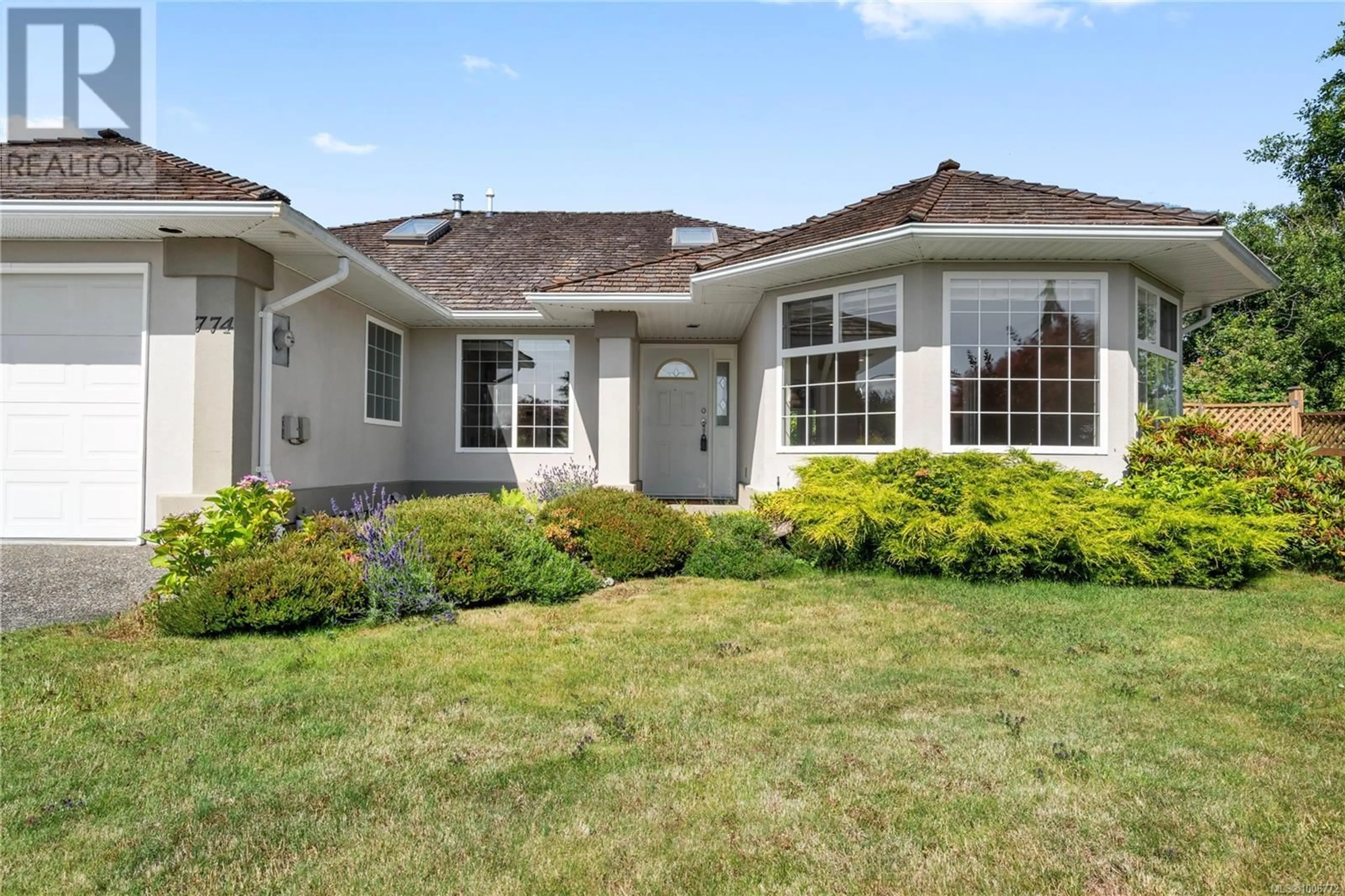 Home with vinyl exterior material, street for 774 CHARTWELL BOULEVARD, Qualicum Beach British Columbia V9K2J4