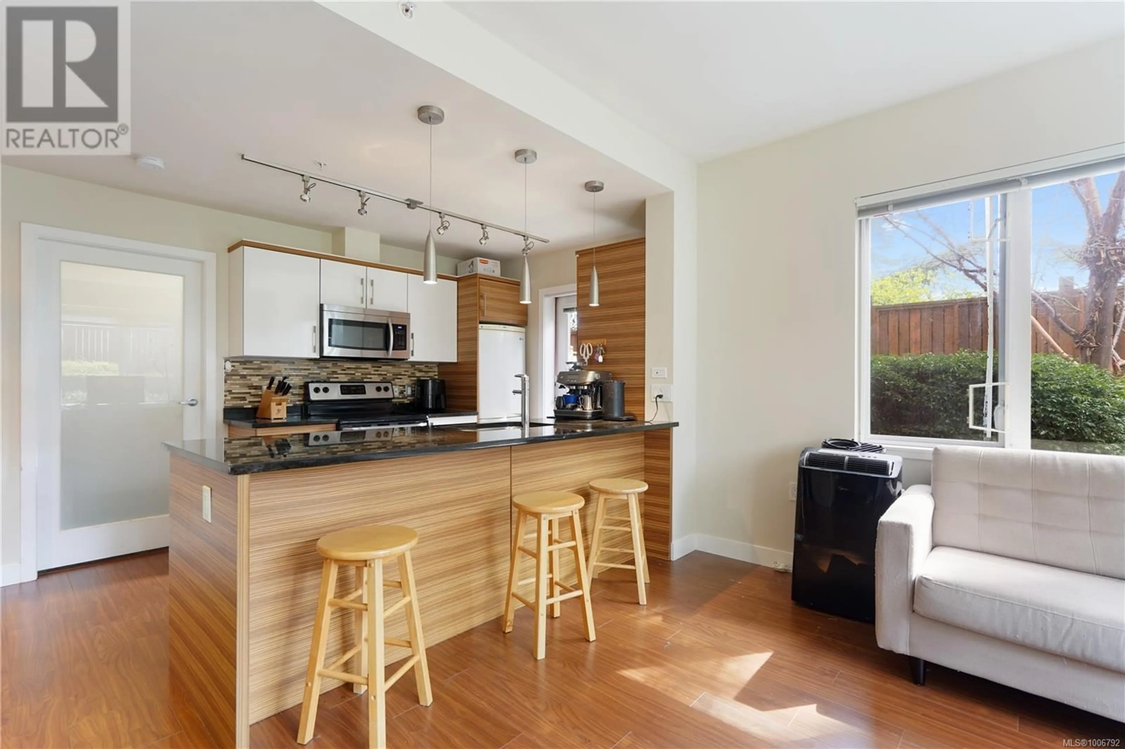 Open concept kitchen, unknown for 104 - 4030 BORDEN STREET, Saanich British Columbia V8X2E9
