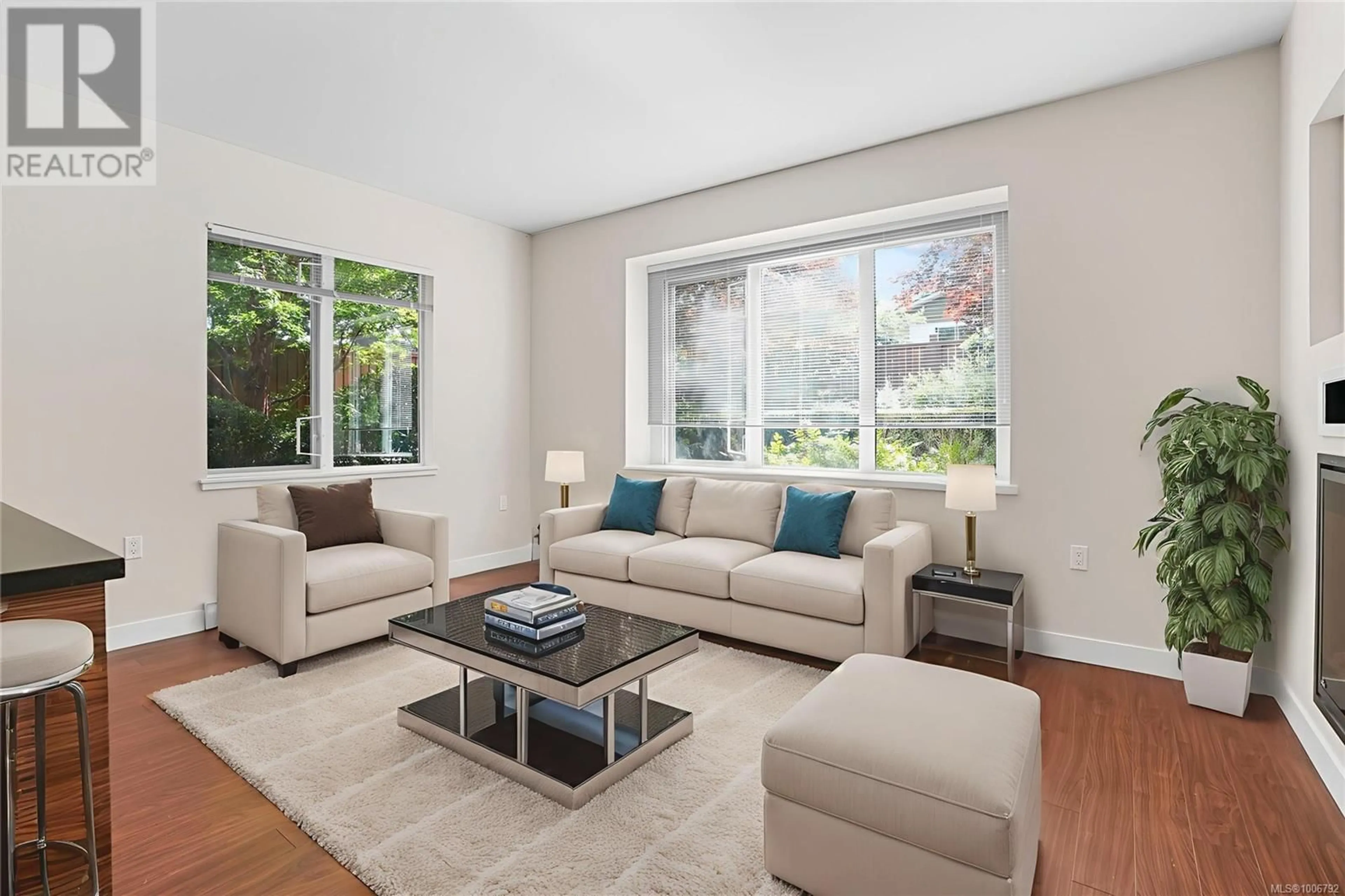 Living room with furniture, unknown for 104 - 4030 BORDEN STREET, Saanich British Columbia V8X2E9