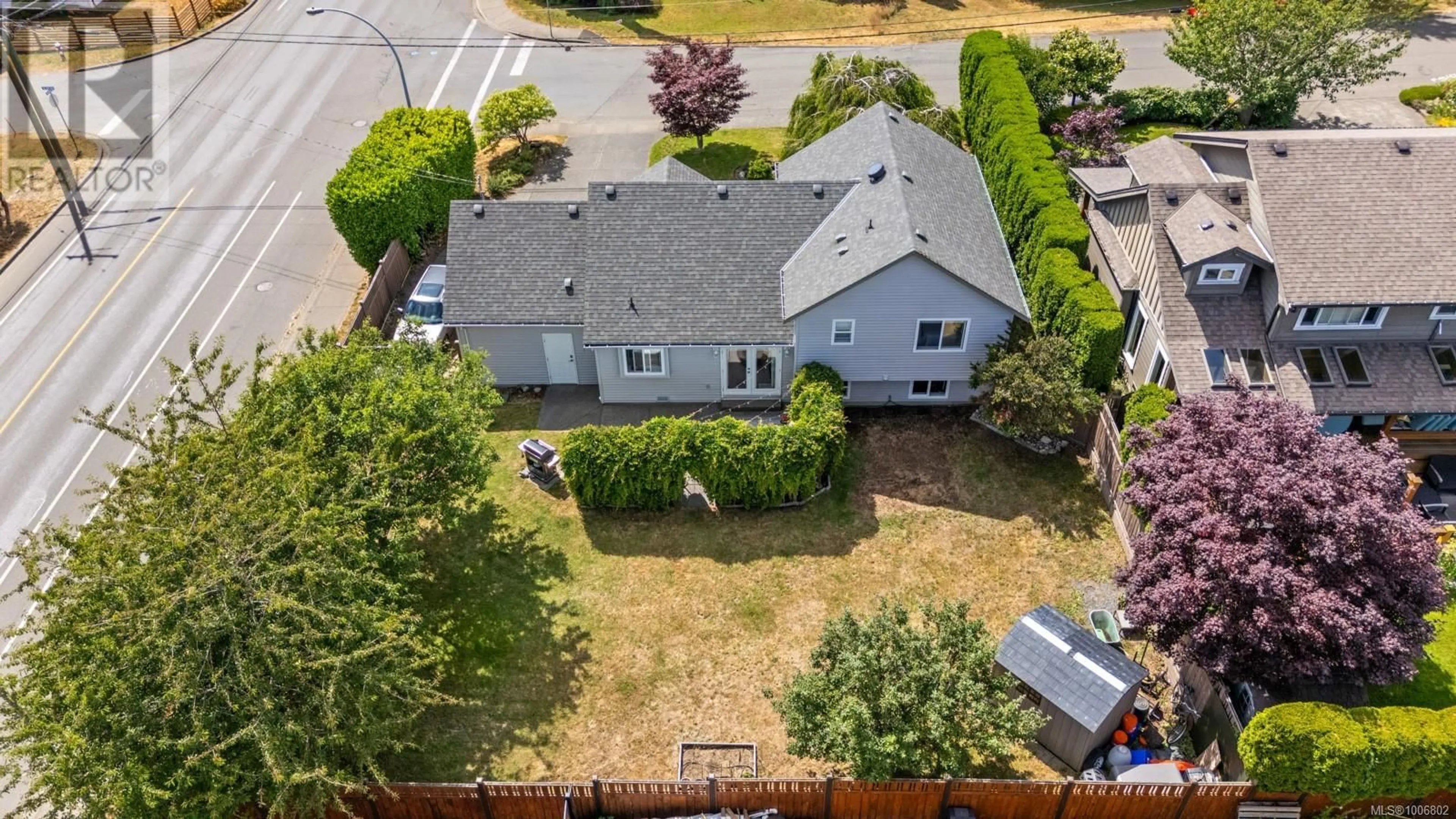 A pic from outside/outdoor area/front of a property/back of a property/a pic from drone, street for 504 HAIDA STREET, Comox British Columbia V9M3S2