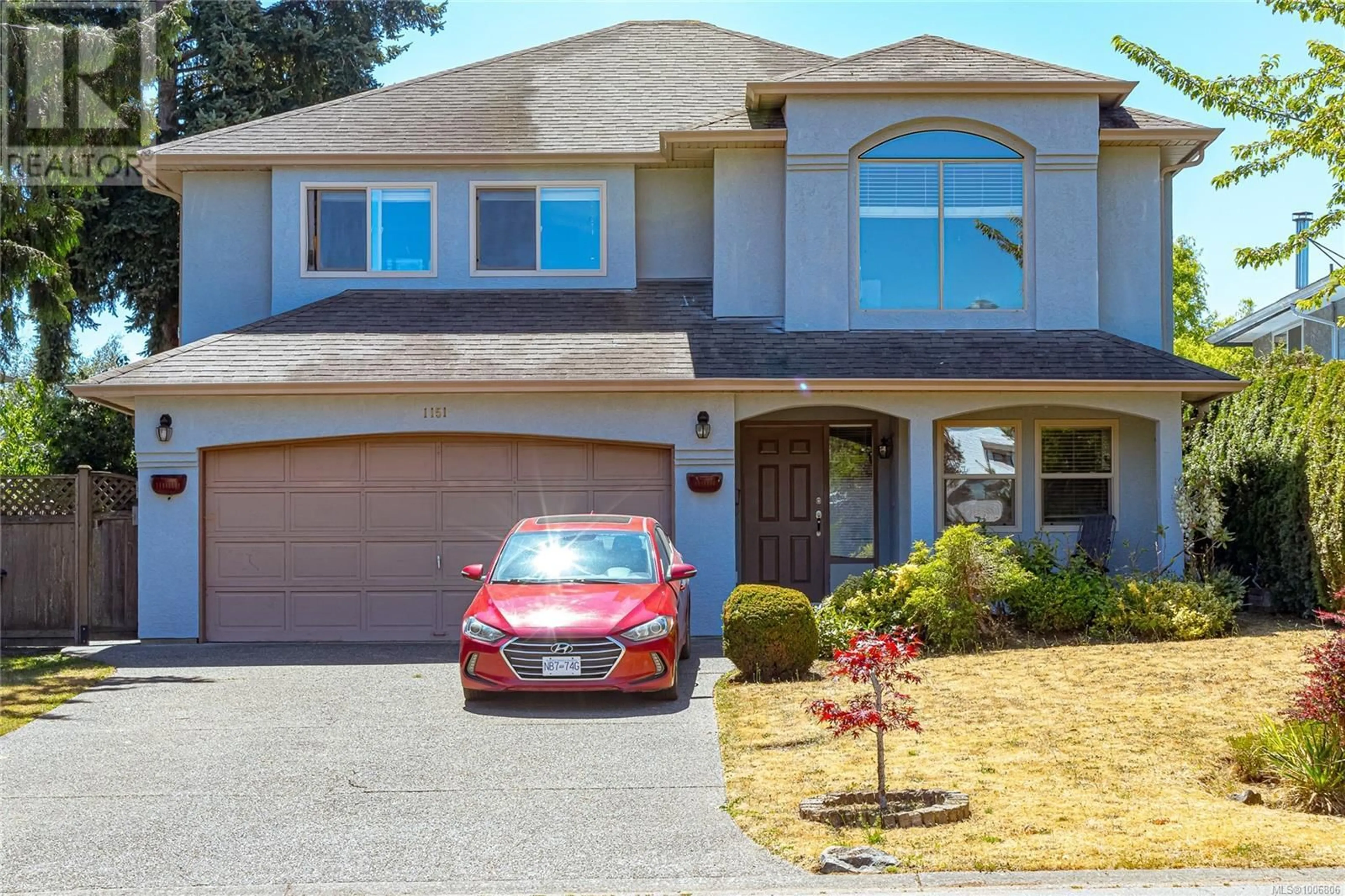 Home with vinyl exterior material, street for 1151 CHERRY ROAD, Saanich British Columbia V8Z7G3