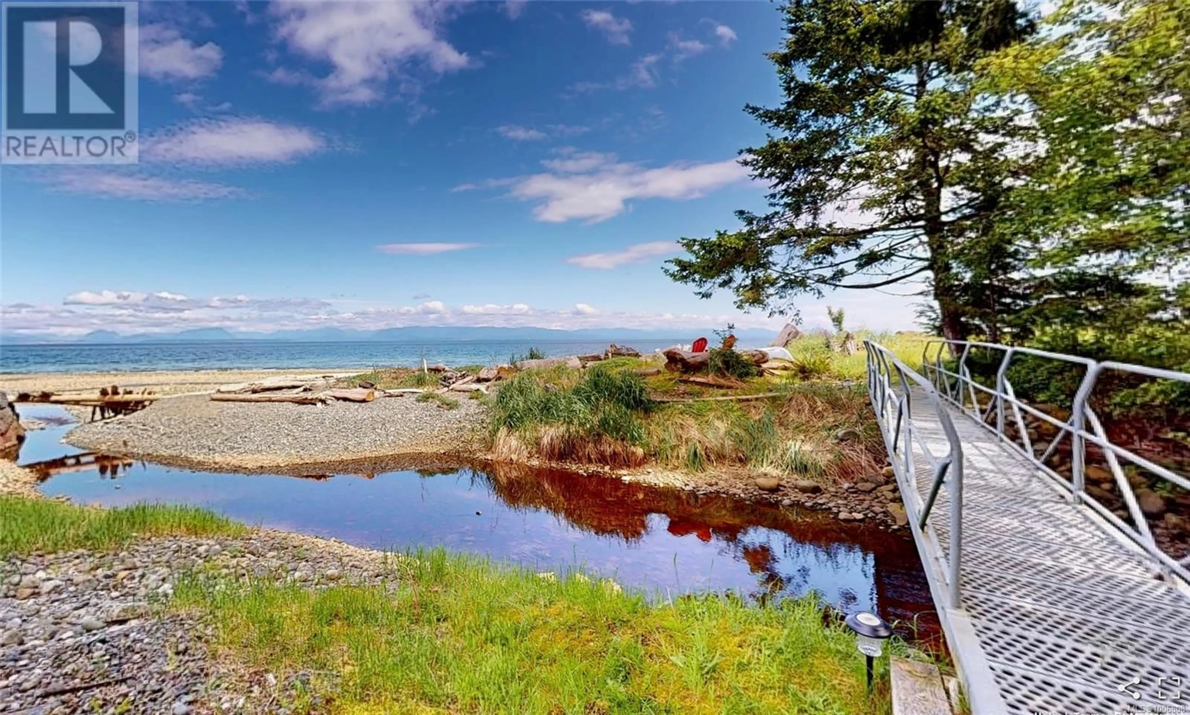 A pic from outside/outdoor area/front of a property/back of a property/a pic from drone, water/lake/river/ocean view for 1396 SEAVIEW ROAD, Black Creek British Columbia V9J1J7