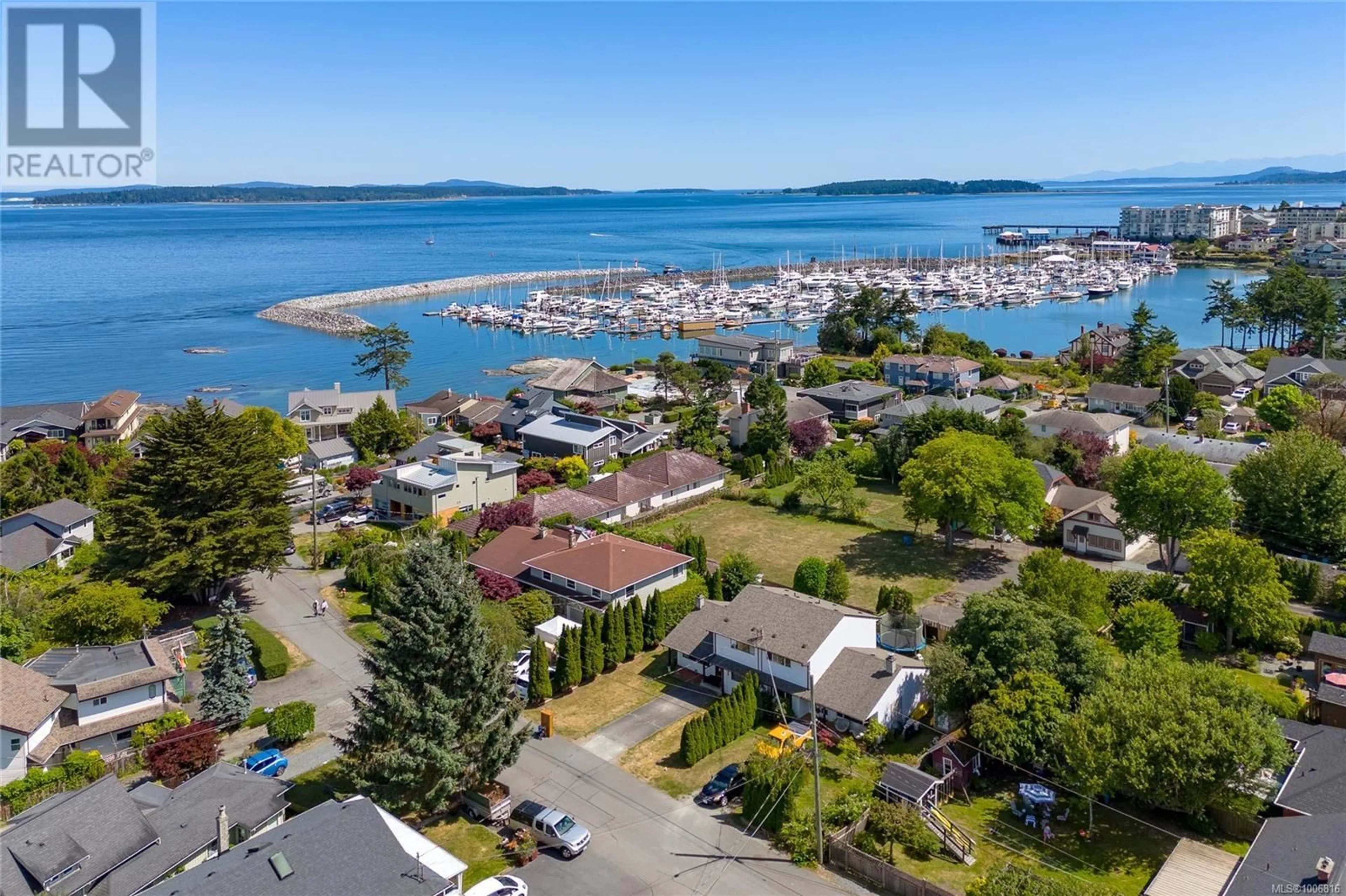 A pic from outside/outdoor area/front of a property/back of a property/a pic from drone, water/lake/river/ocean view for 2487 SHOREACRES ROAD, Sidney British Columbia V8L2E3