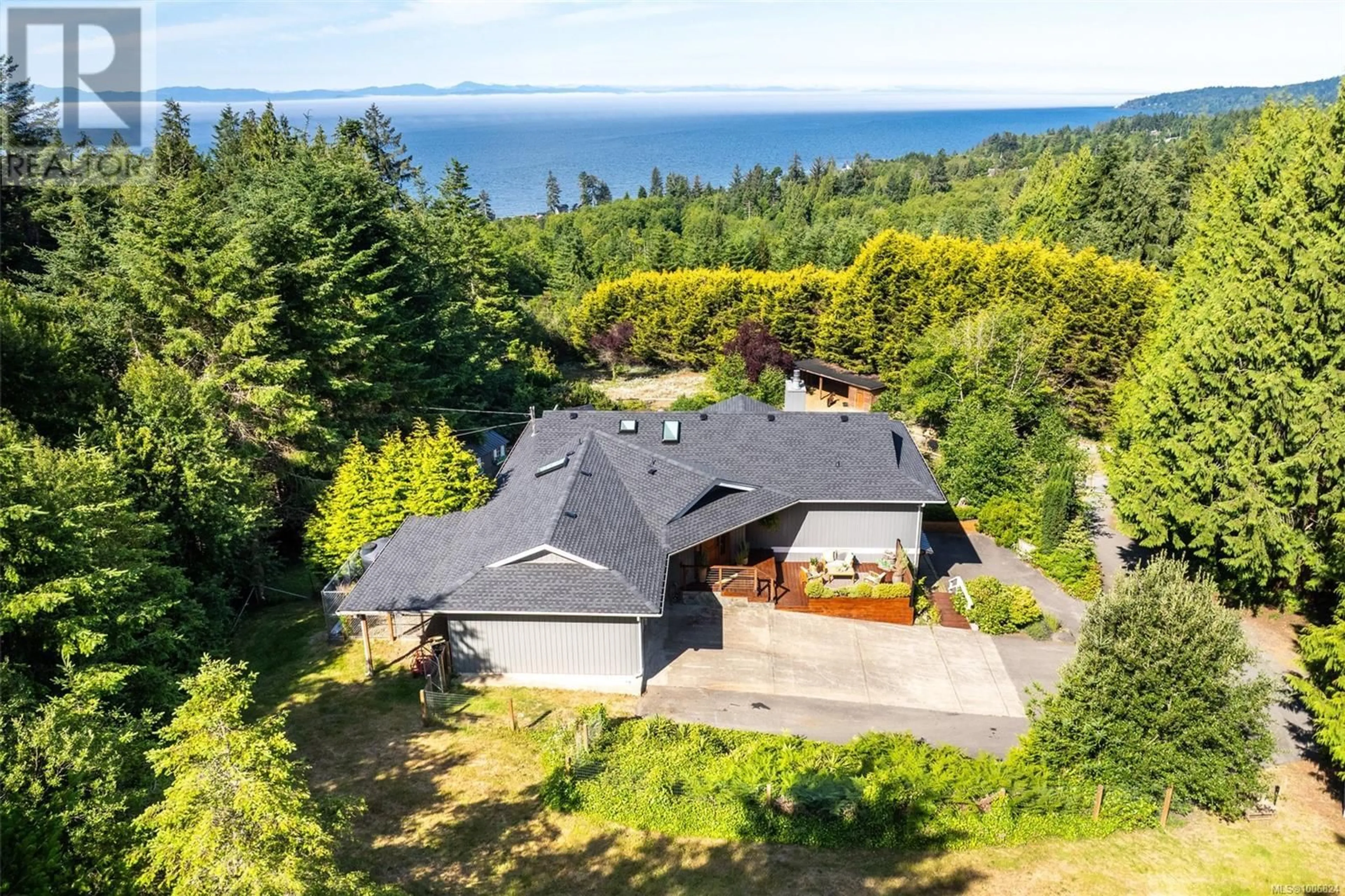 A pic from outside/outdoor area/front of a property/back of a property/a pic from drone, water/lake/river/ocean view for 4475 OTTER POINT ROAD, Sooke British Columbia V9Z0K4