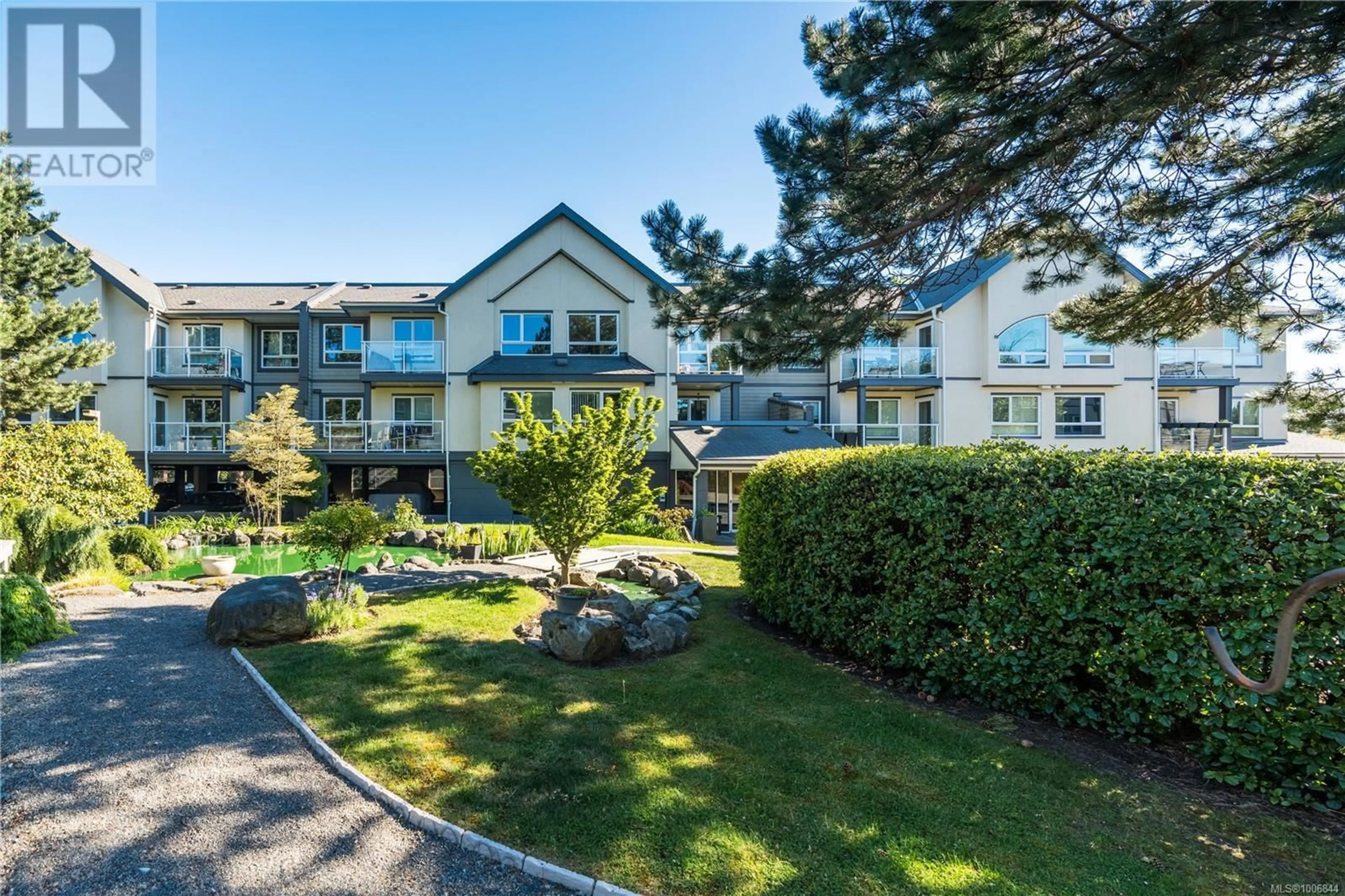 A pic from outside/outdoor area/front of a property/back of a property/a pic from drone, unknown for 220 - 2245 JAMES WHITE BOULEVARD, Sidney British Columbia V8L1Z5