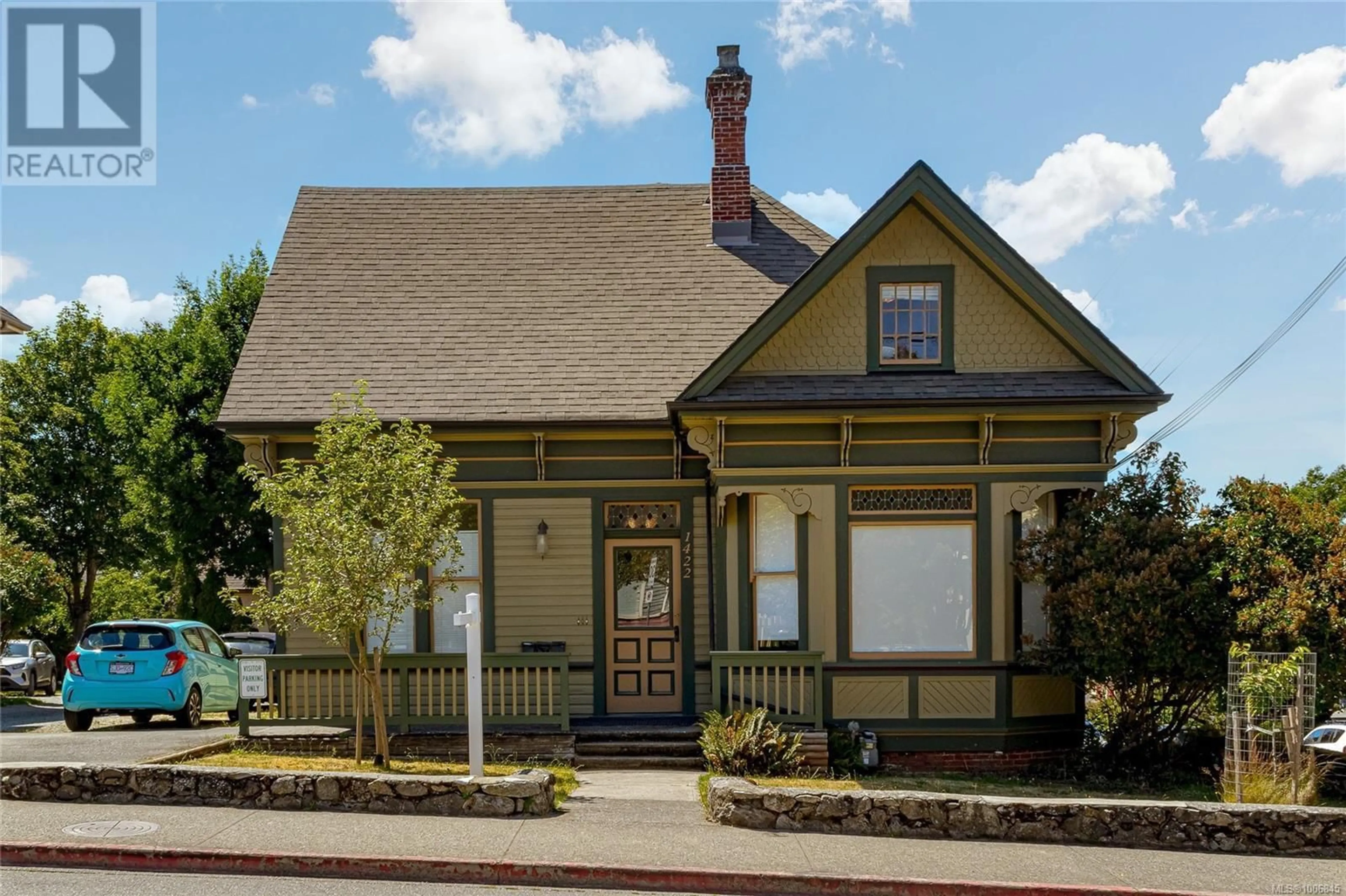 Home with brick exterior material, street for 1422 FERNWOOD ROAD, Victoria British Columbia V8V4P7