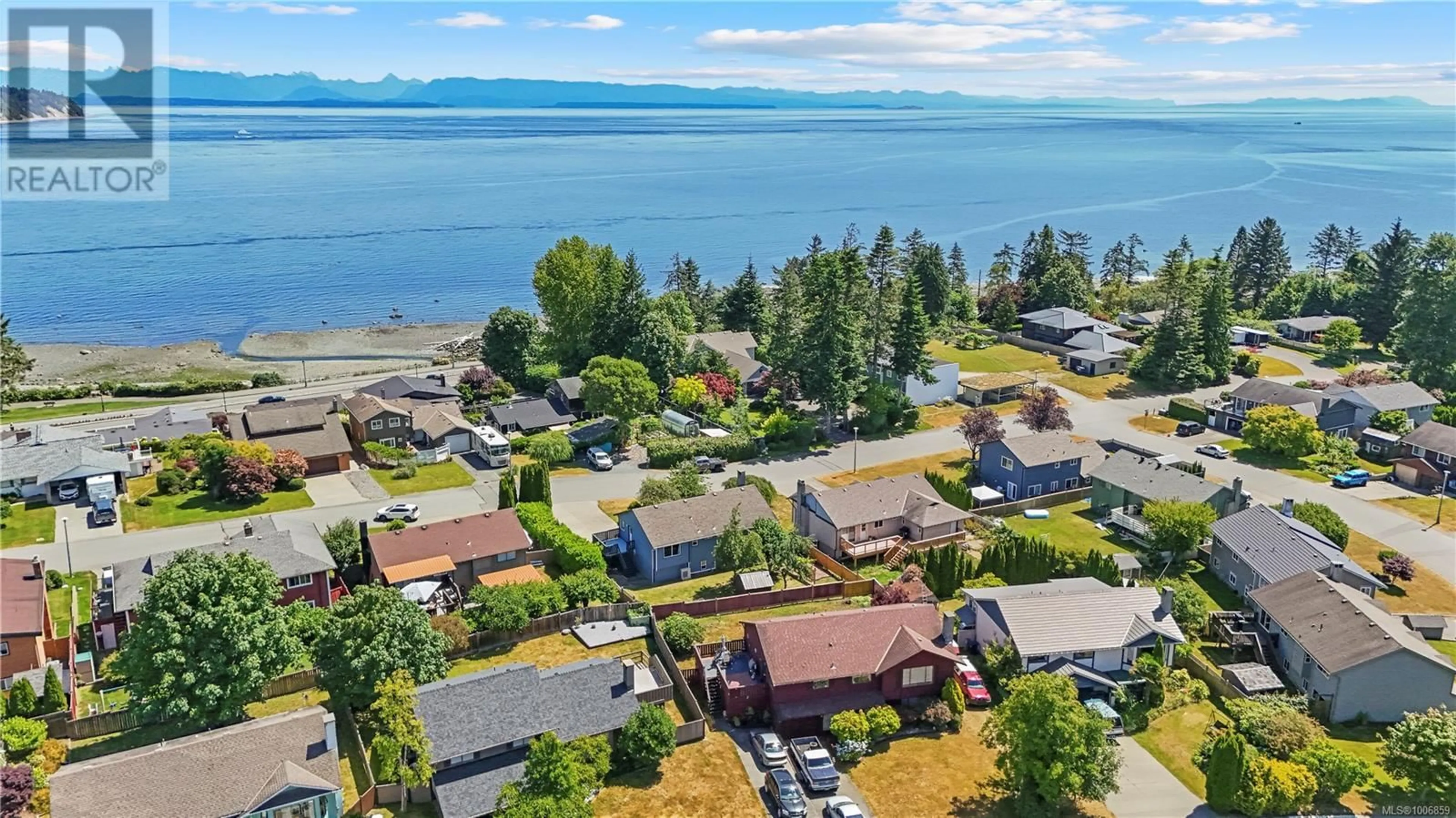 A pic from outside/outdoor area/front of a property/back of a property/a pic from drone, water/lake/river/ocean view for 1686 PASSAGE VIEW DRIVE, Campbell River British Columbia V9W6L3