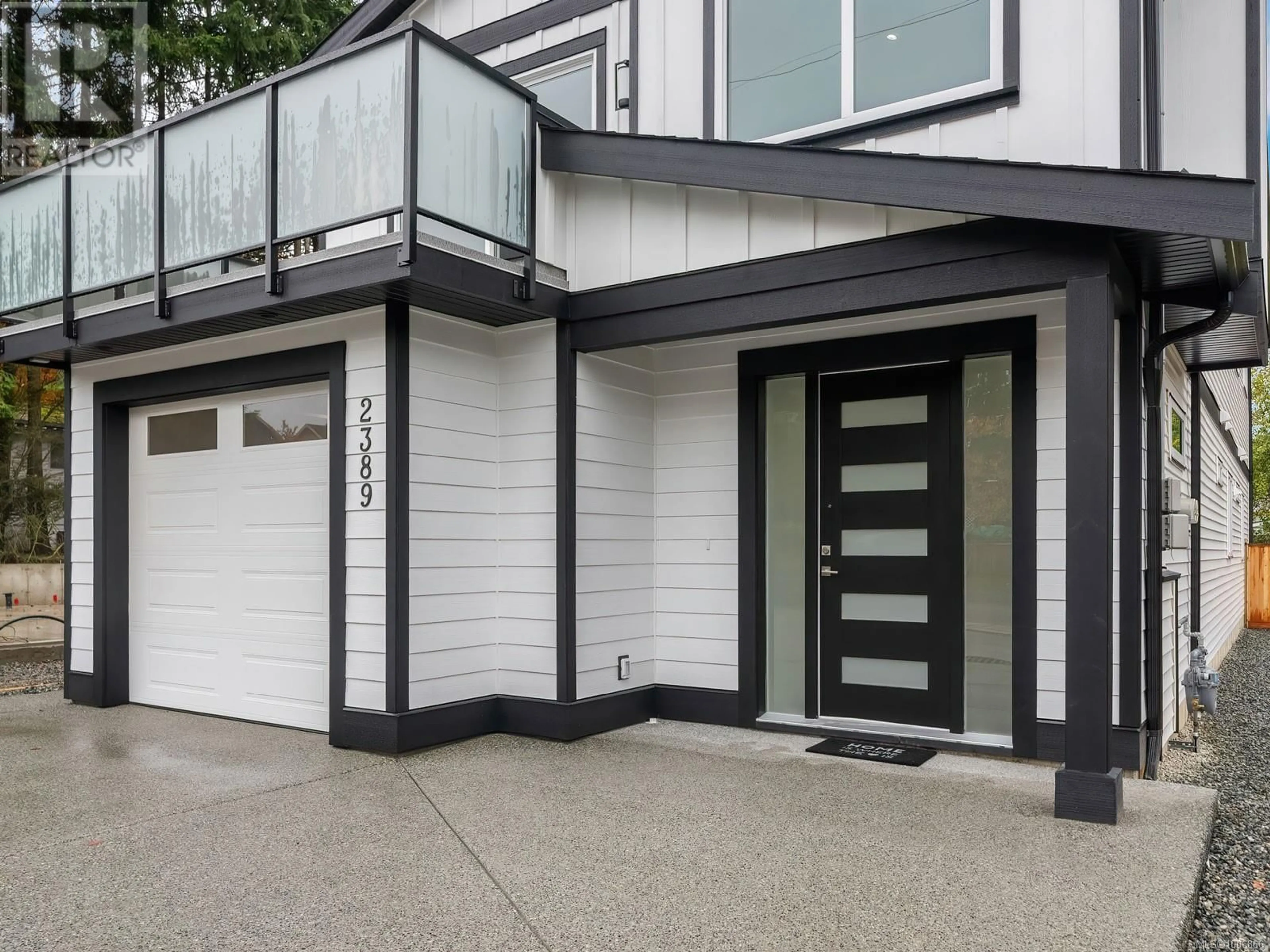 Home with vinyl exterior material, street for 2393 BARCLAY ROAD, Nanaimo British Columbia V9T3J8