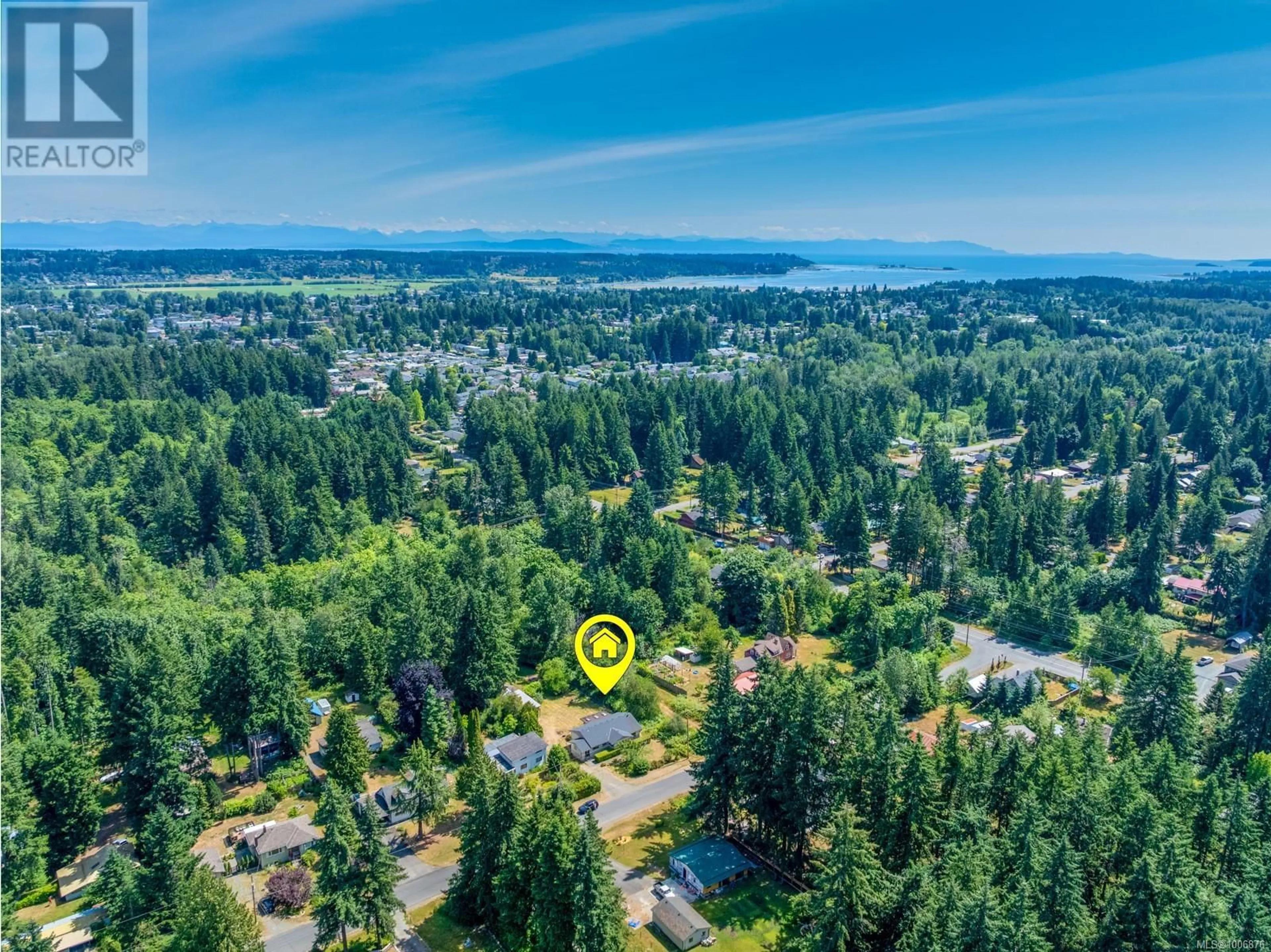 A pic from outside/outdoor area/front of a property/back of a property/a pic from drone, water/lake/river/ocean view for 850 TIMBERLANE ROAD, Courtenay British Columbia V9N9K9