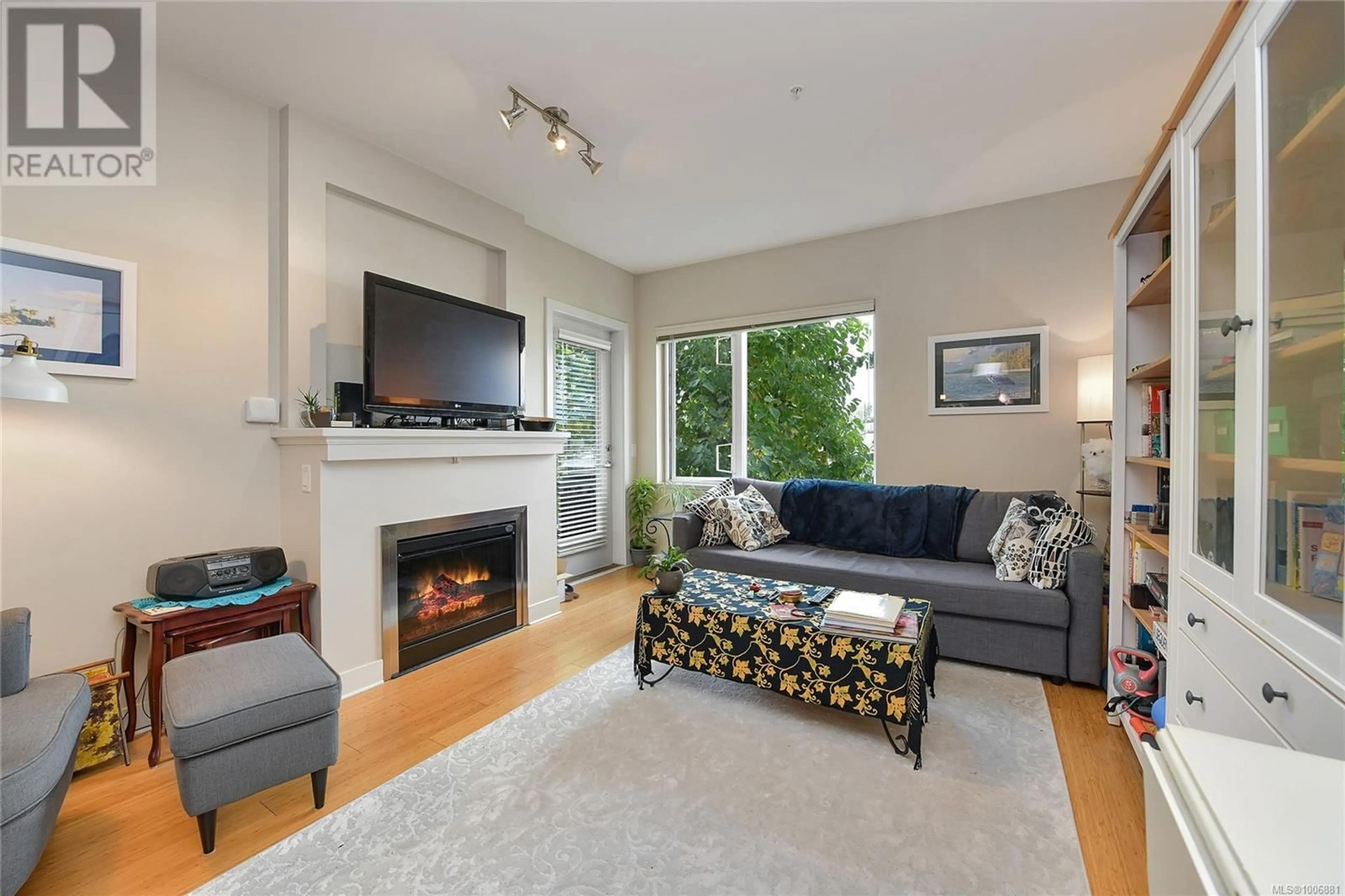 Living room with furniture, unknown for 208 - 4394 WEST SAANICH ROAD, Saanich British Columbia V8Z0B5