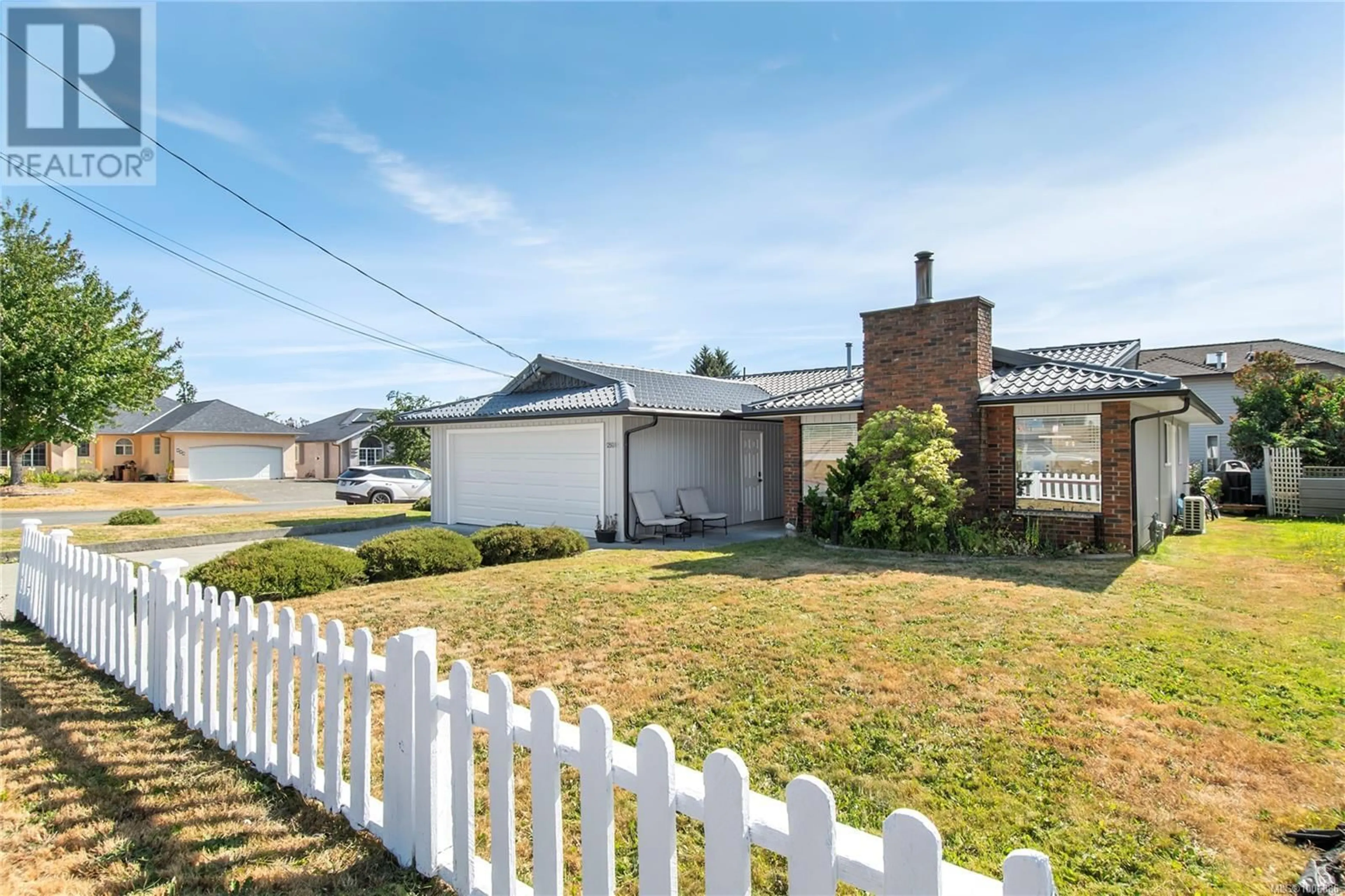 A pic from outside/outdoor area/front of a property/back of a property/a pic from drone, street for 2501 ALDER STREET SOUTH, Campbell River British Columbia V9W5T3