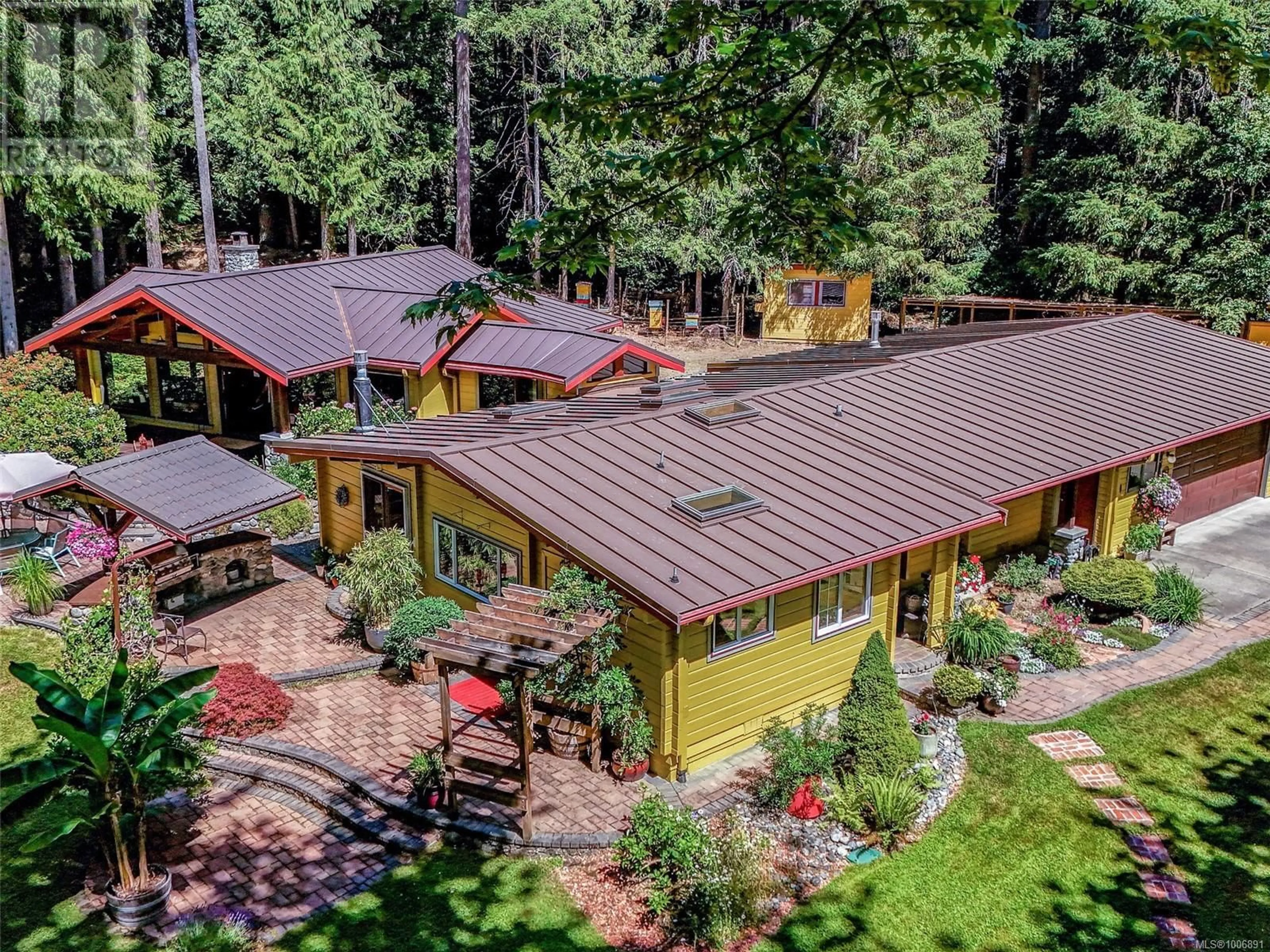 A pic from outside/outdoor area/front of a property/back of a property/a pic from drone, forest/trees view for 2005 RENFREW ROAD, Shawnigan Lake British Columbia V0R2W0