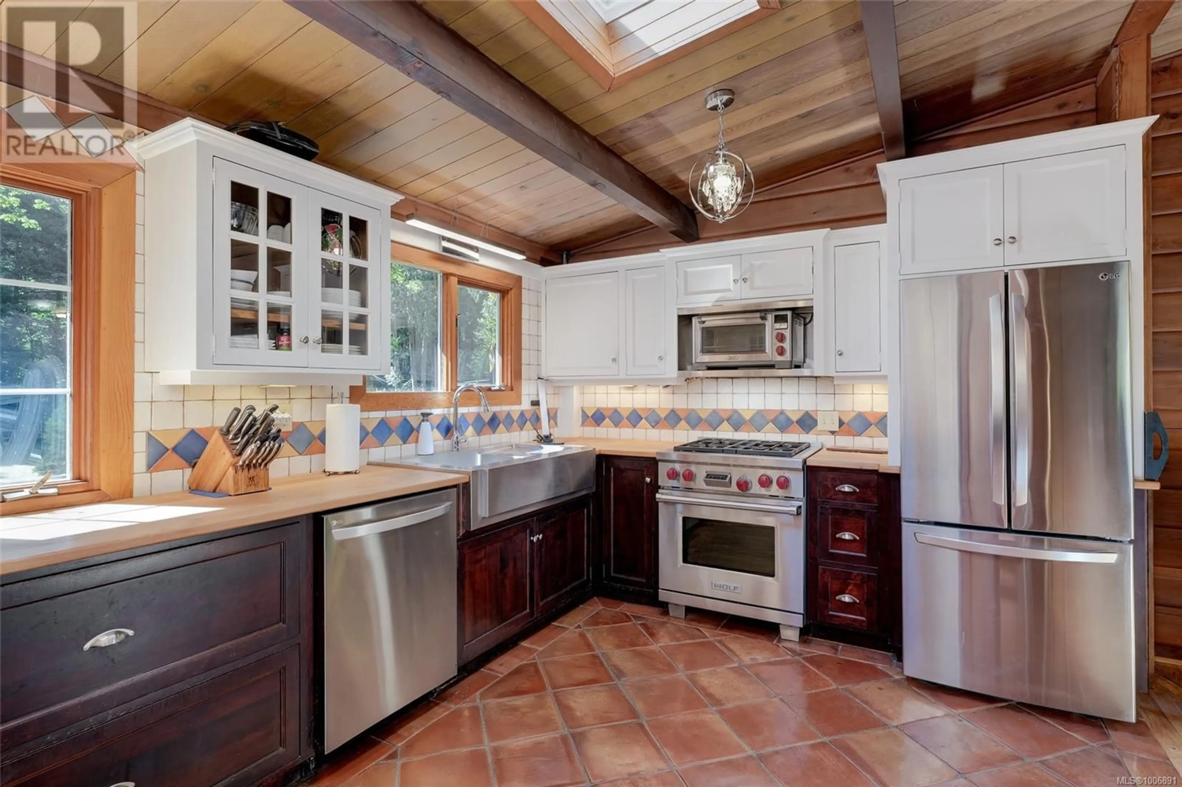 Rustic kitchen, ceramic/tile floor for 2005 RENFREW ROAD, Shawnigan Lake British Columbia V0R2W0