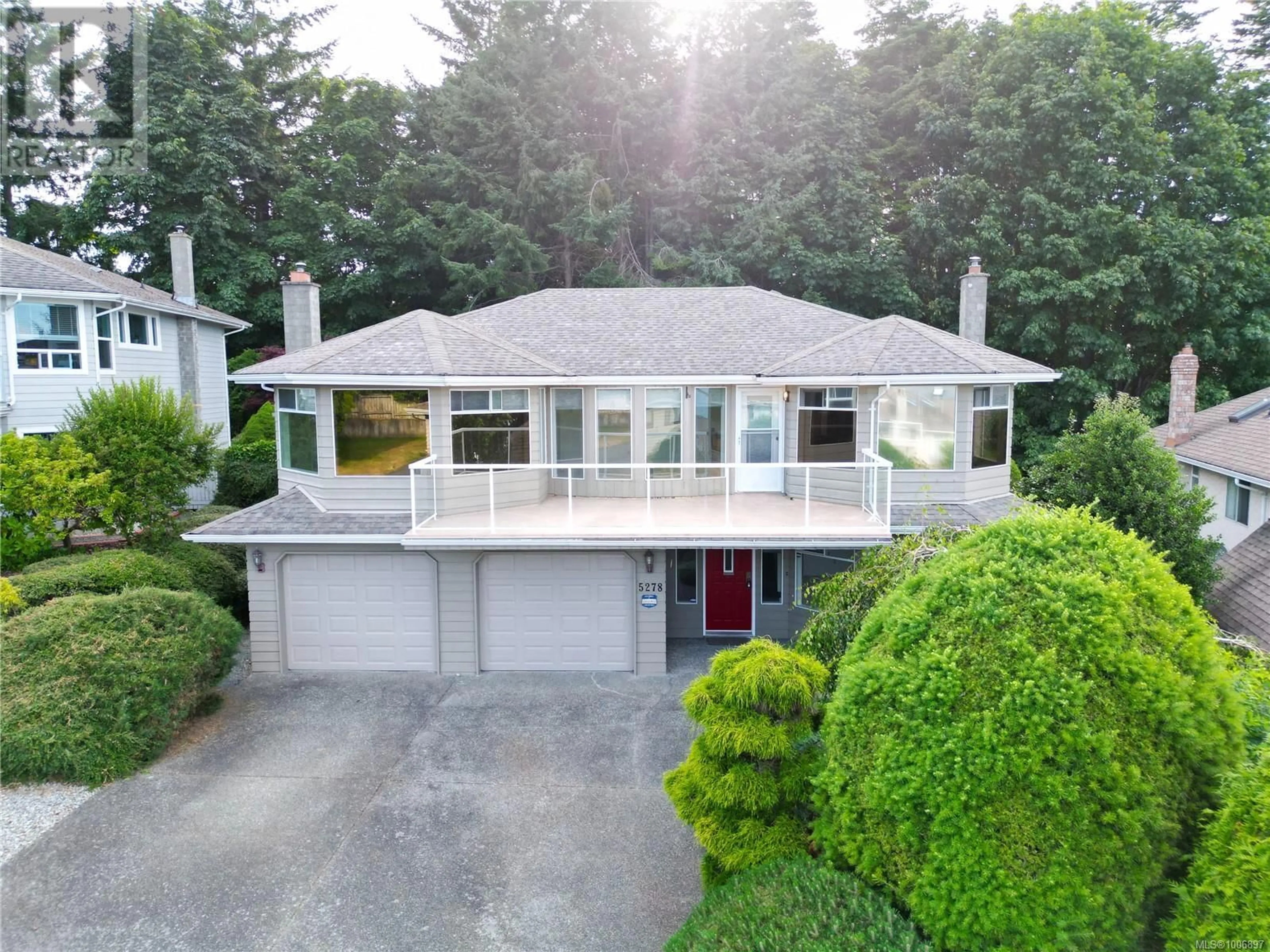 A pic from outside/outdoor area/front of a property/back of a property/a pic from drone, street for 5278 FILLINGER CRESCENT, Nanaimo British Columbia V9V1H7