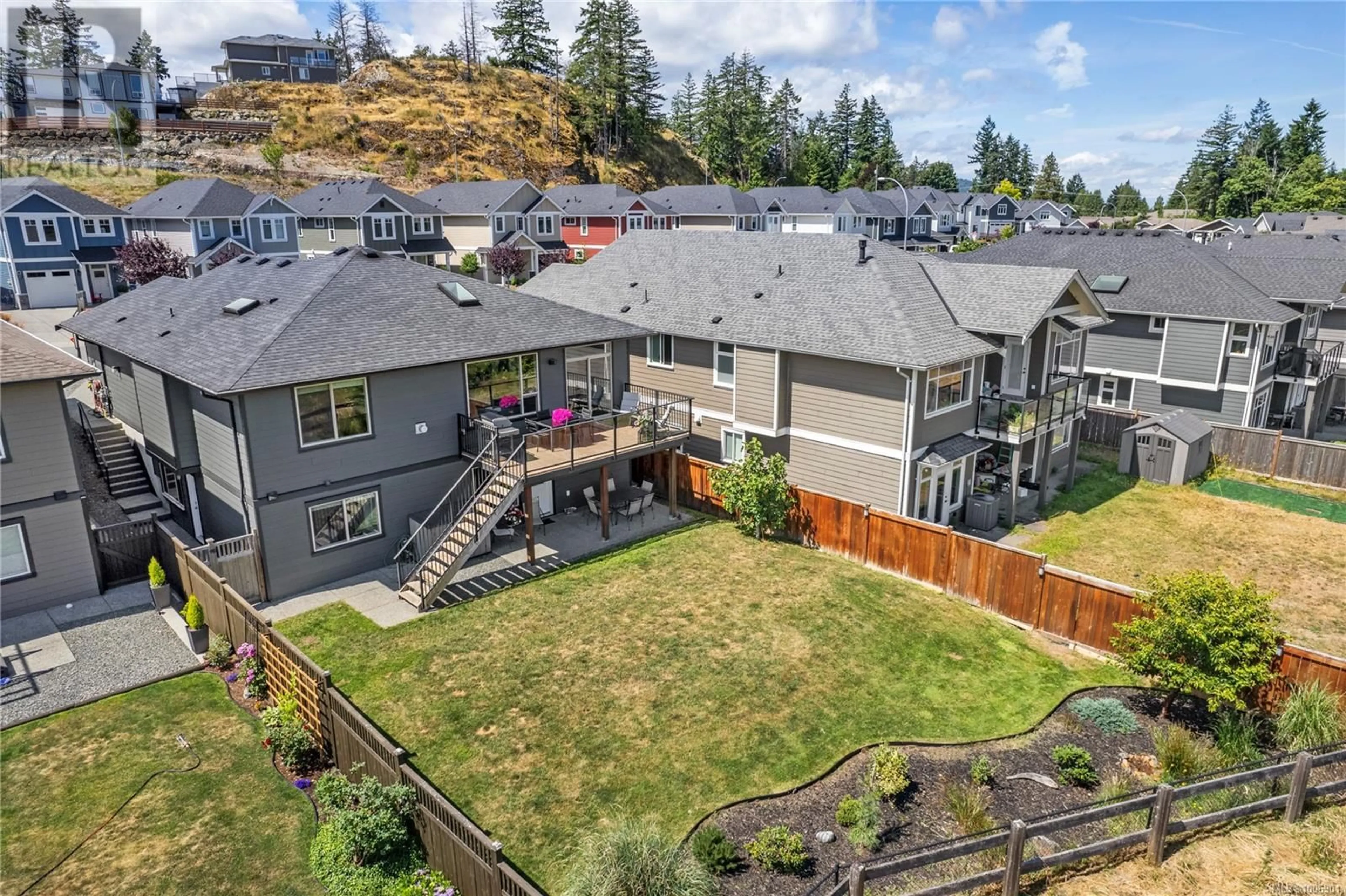 A pic from outside/outdoor area/front of a property/back of a property/a pic from drone, mountain view for 5836 LINYARD ROAD, Nanaimo British Columbia V9T0G6