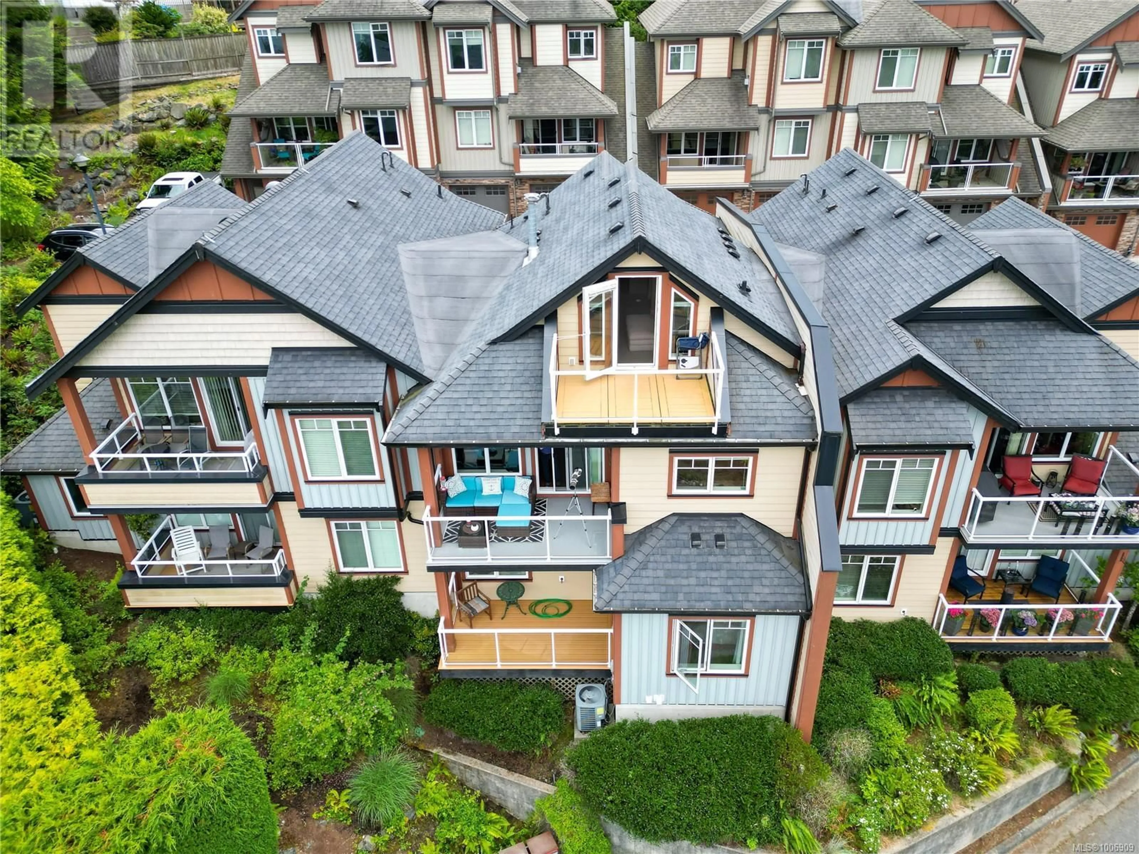 A pic from outside/outdoor area/front of a property/back of a property/a pic from drone, city buildings view from balcony for 102 - 4715 SKYLINE WAY, Nanaimo British Columbia V9T0C1