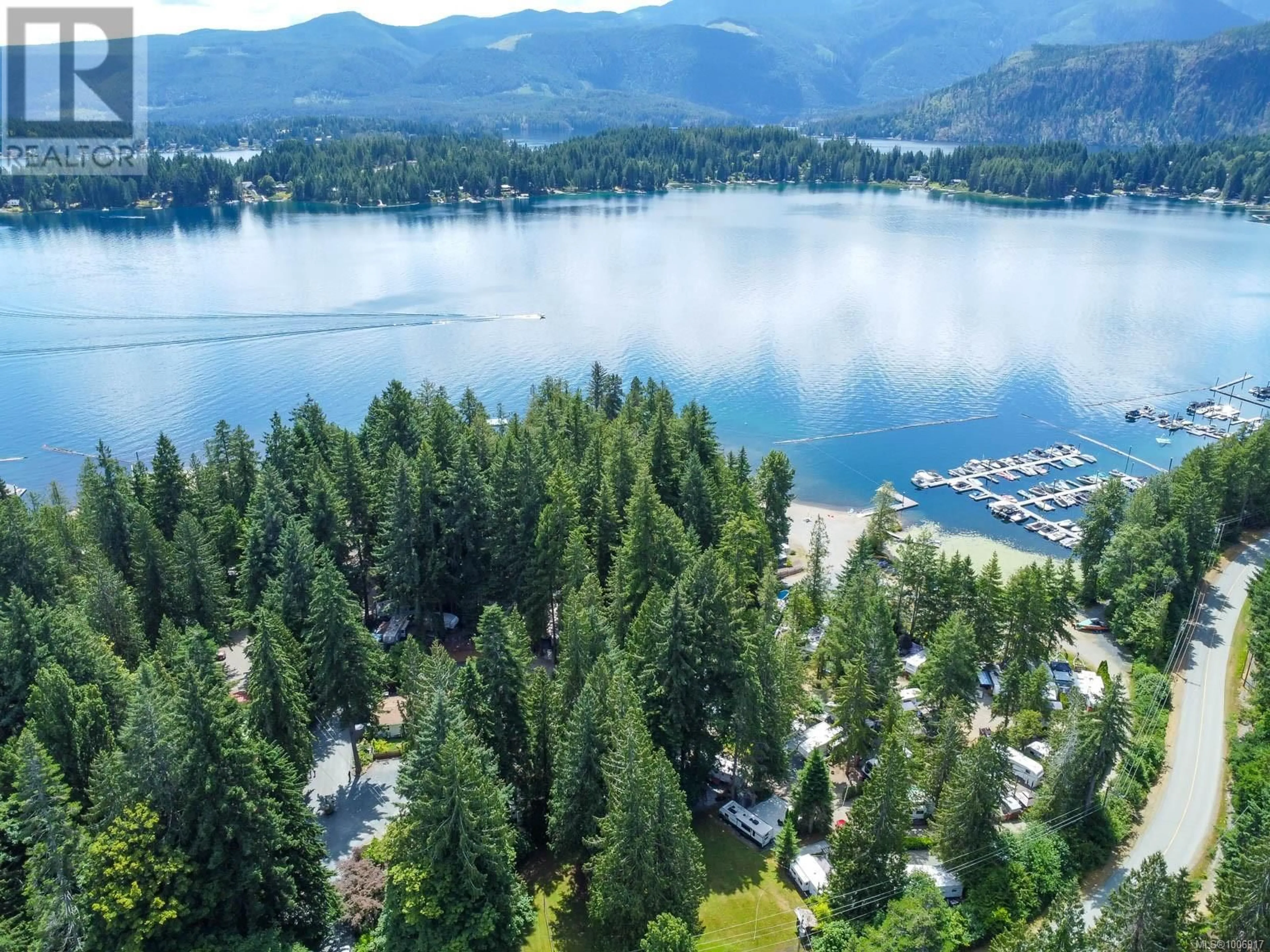 A pic from outside/outdoor area/front of a property/back of a property/a pic from drone, water/lake/river/ocean view for B7 - 10324 LAKESHORE ROAD, Port Alberni British Columbia V9Y8Z6