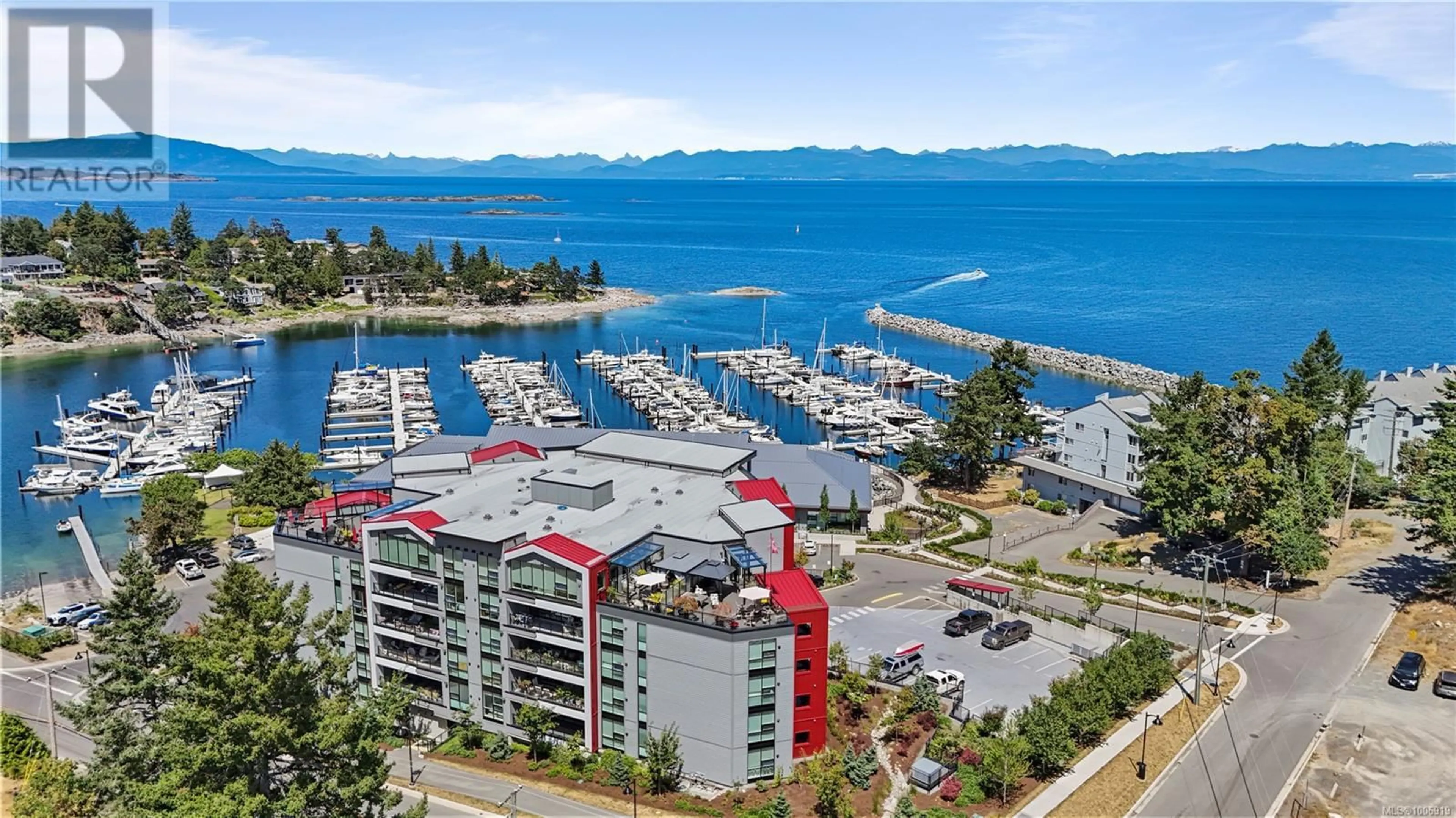A pic from outside/outdoor area/front of a property/back of a property/a pic from drone, water/lake/river/ocean view for 604 - 3529 DOLPHIN DRIVE, Nanoose Bay British Columbia V9P9J7