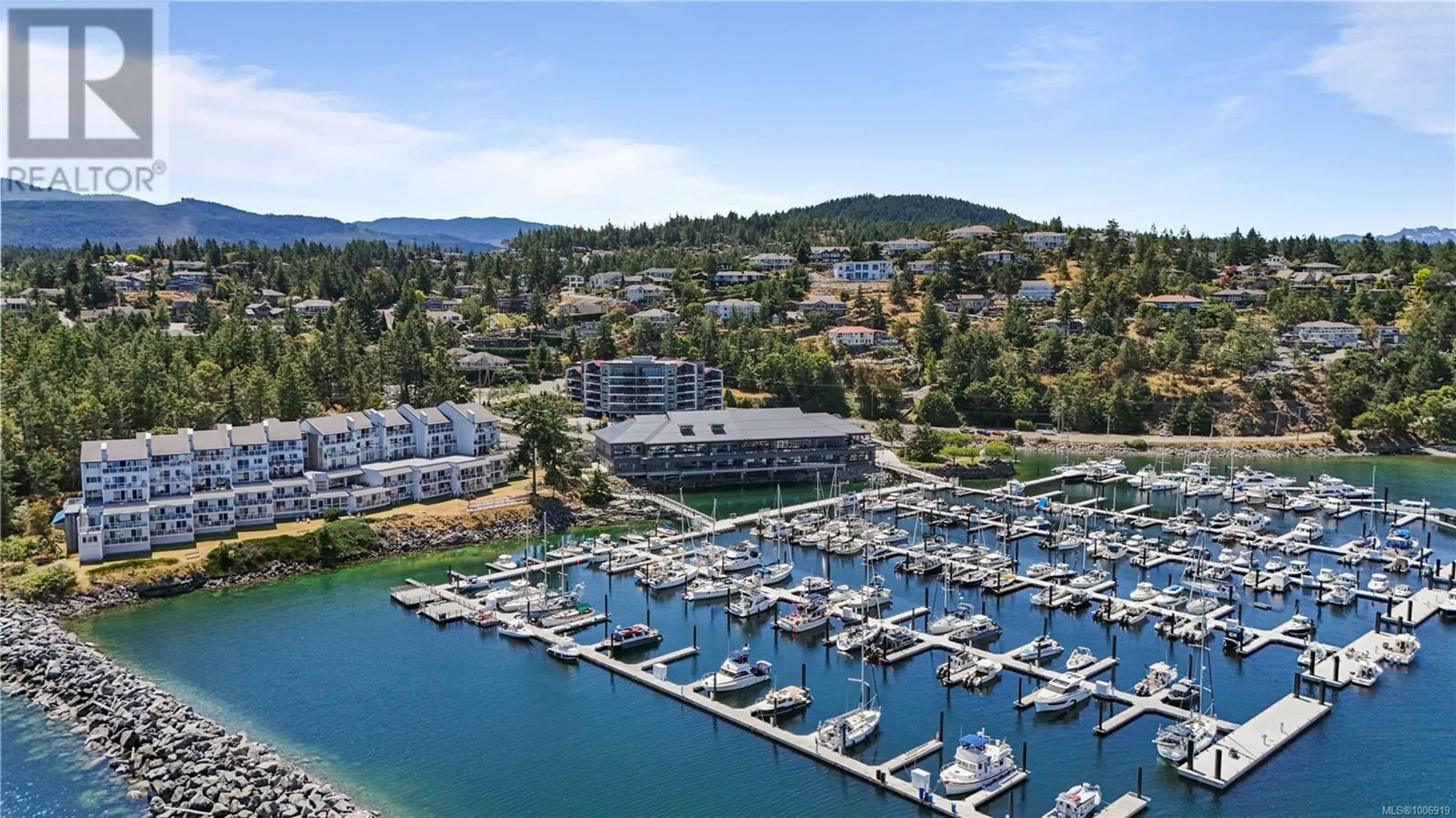 A pic from outside/outdoor area/front of a property/back of a property/a pic from drone, water/lake/river/ocean view for 604 - 3529 DOLPHIN DRIVE, Nanoose Bay British Columbia V9P9J7
