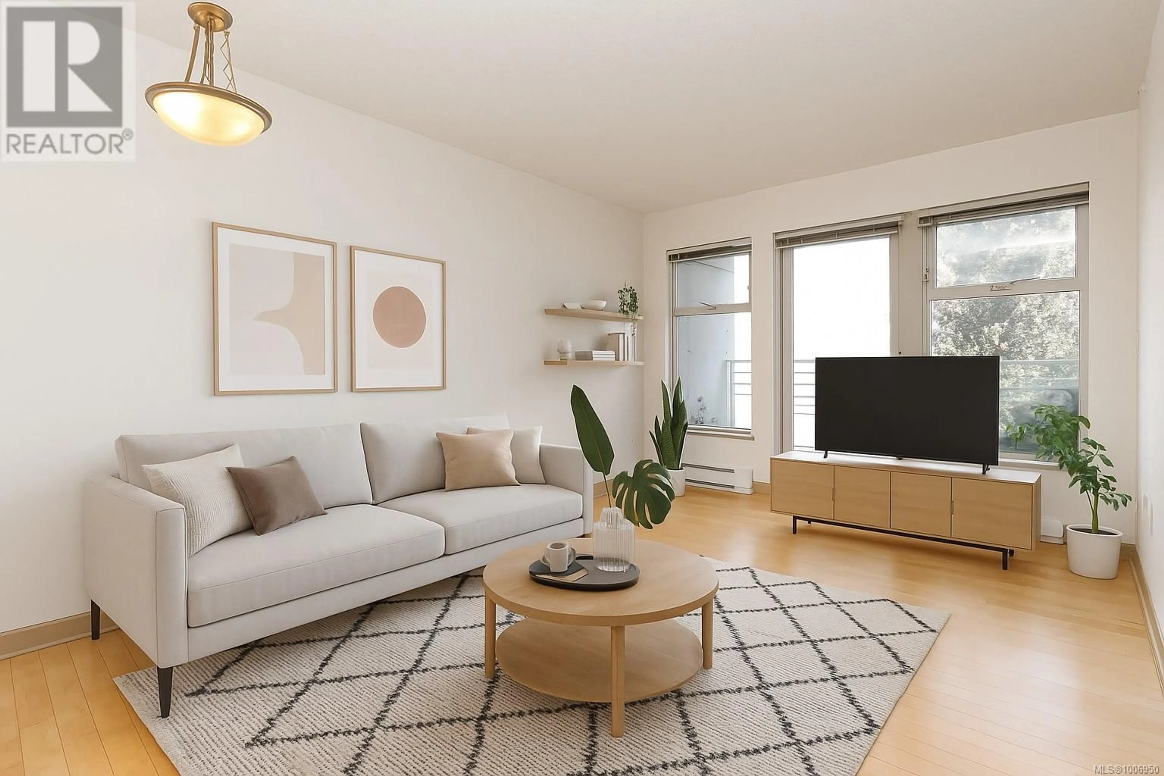 Living room with furniture, wood/laminate floor for 302 - 1030 YATES STREET, Victoria British Columbia V8V5A7