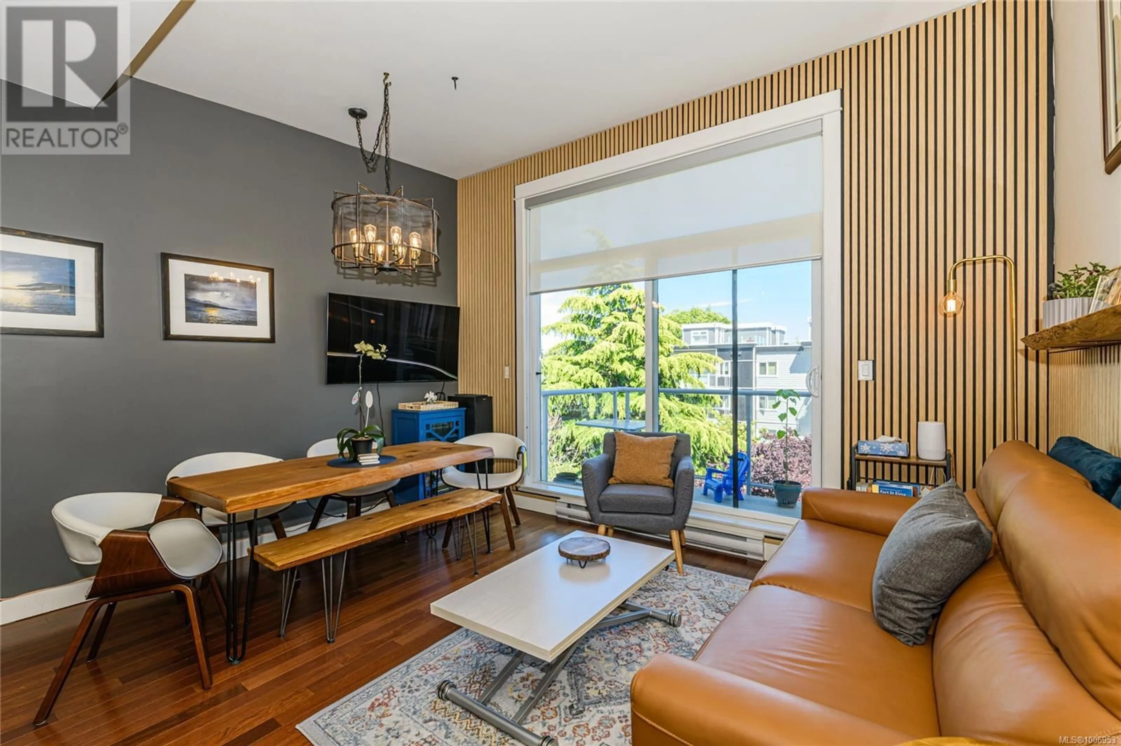 Living room with furniture, wood/laminate floor for 407 - 1315 ESQUIMALT ROAD, Esquimalt British Columbia V9A3P5