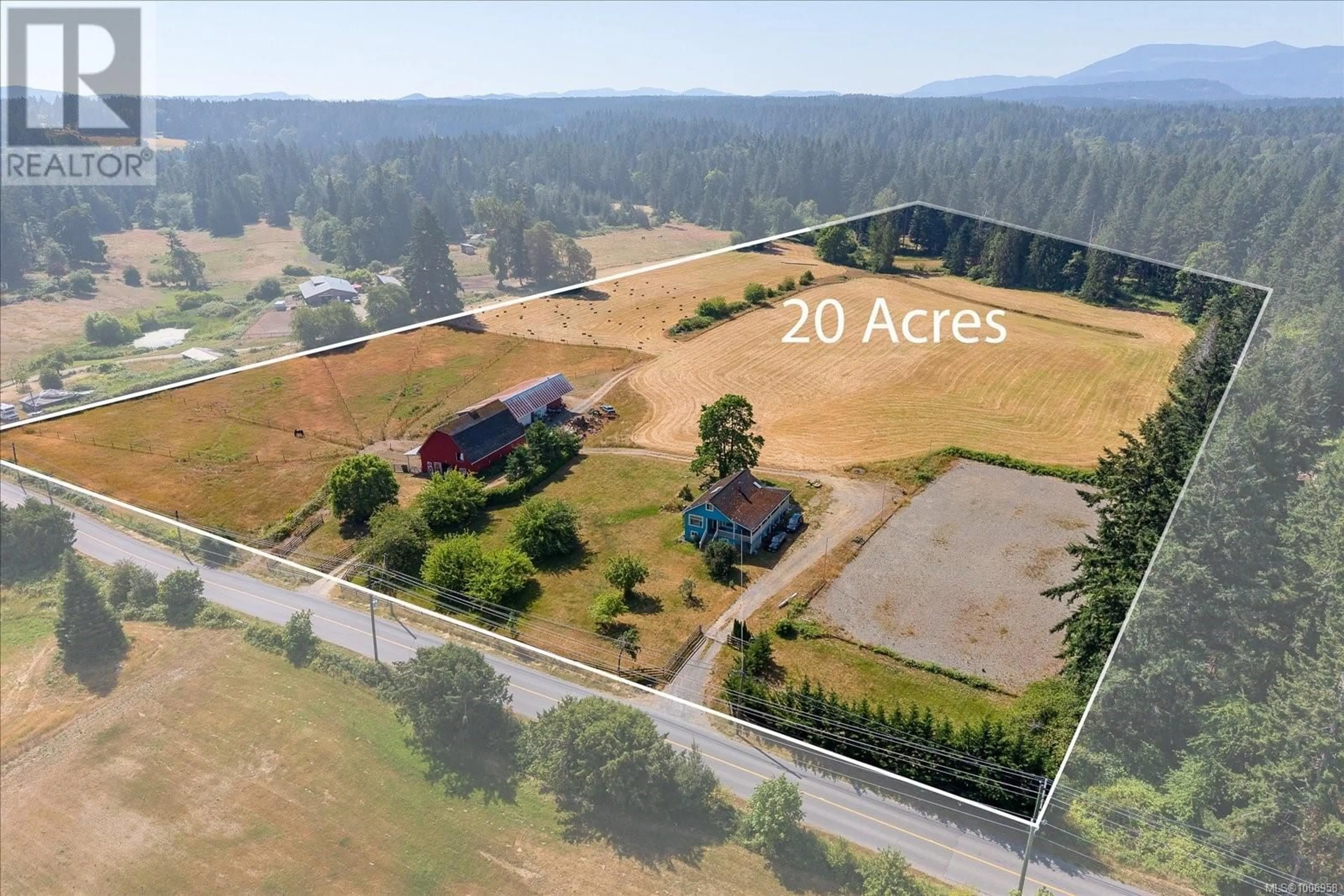 A pic from outside/outdoor area/front of a property/back of a property/a pic from drone, mountain view for 2375 HOLDEN CORSO ROAD, Nanaimo British Columbia V9X1M7