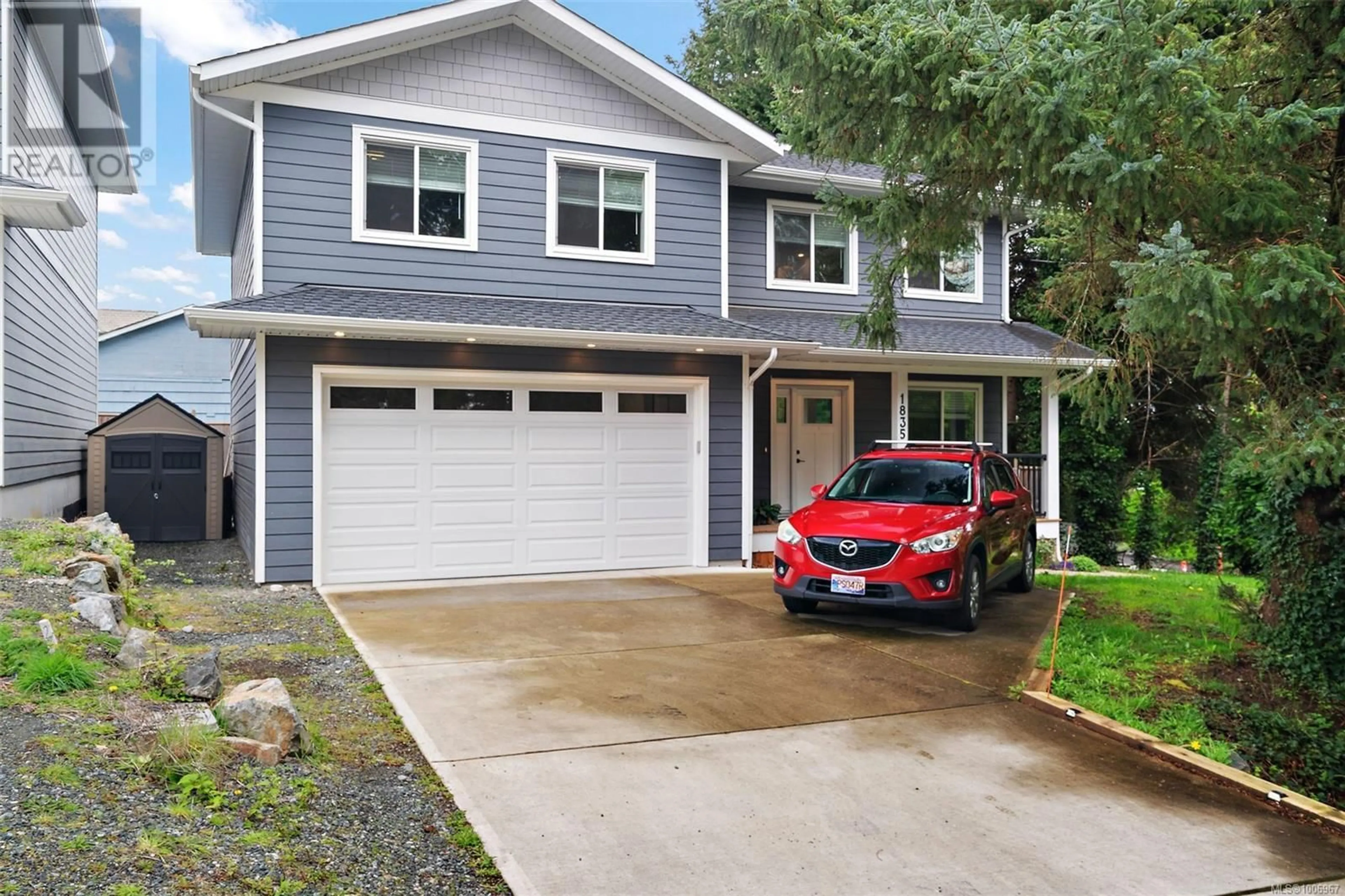 Home with vinyl exterior material, street for 1835 TOMINNY ROAD, Sooke British Columbia V9Z0P8